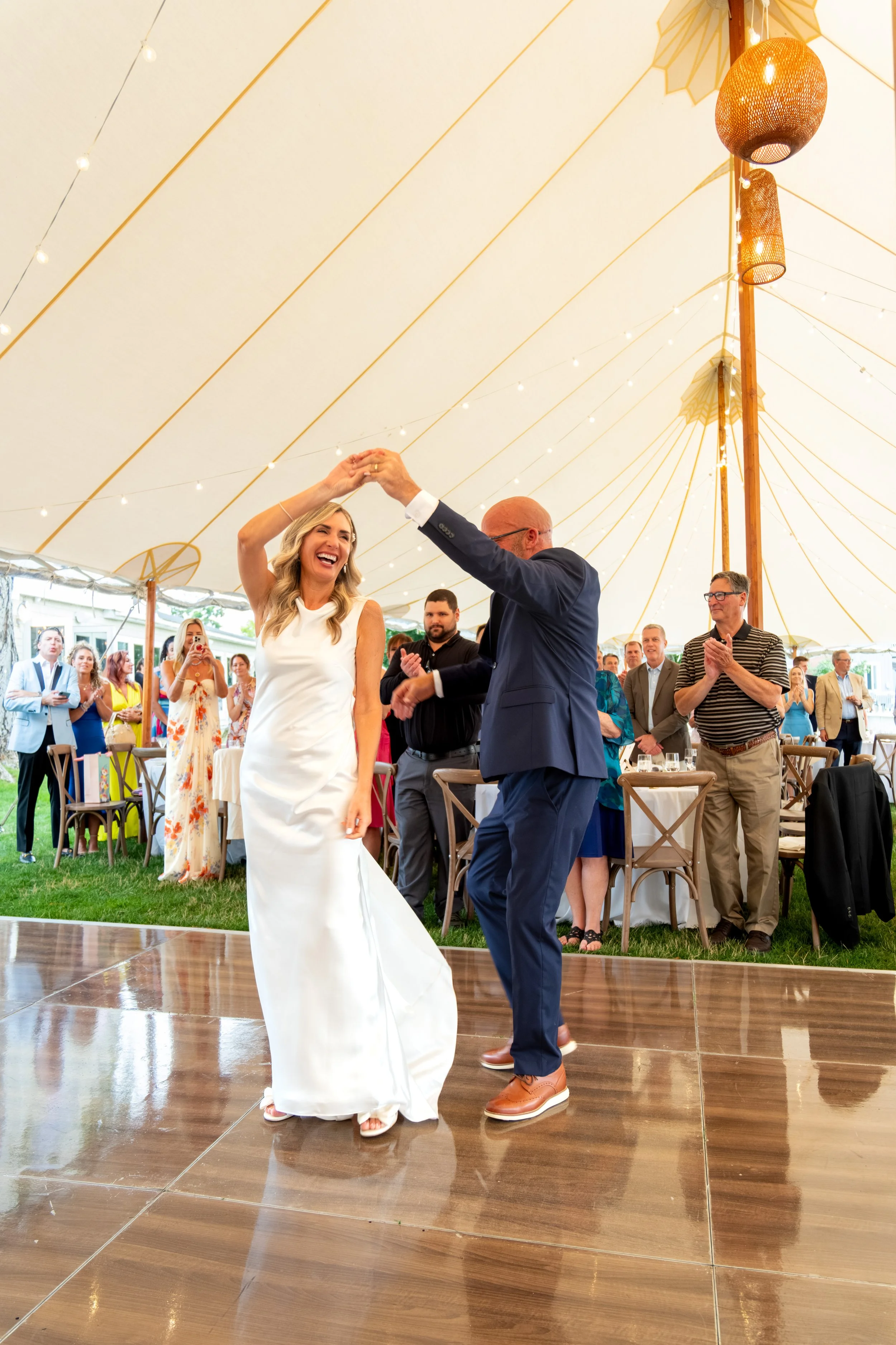 Ashley and Marc Draper sharing their first dance to Sam Cooke under the canvas tent at The Breakwater Inn in Kennebunkport Maine summer wedding photography VMG Productions