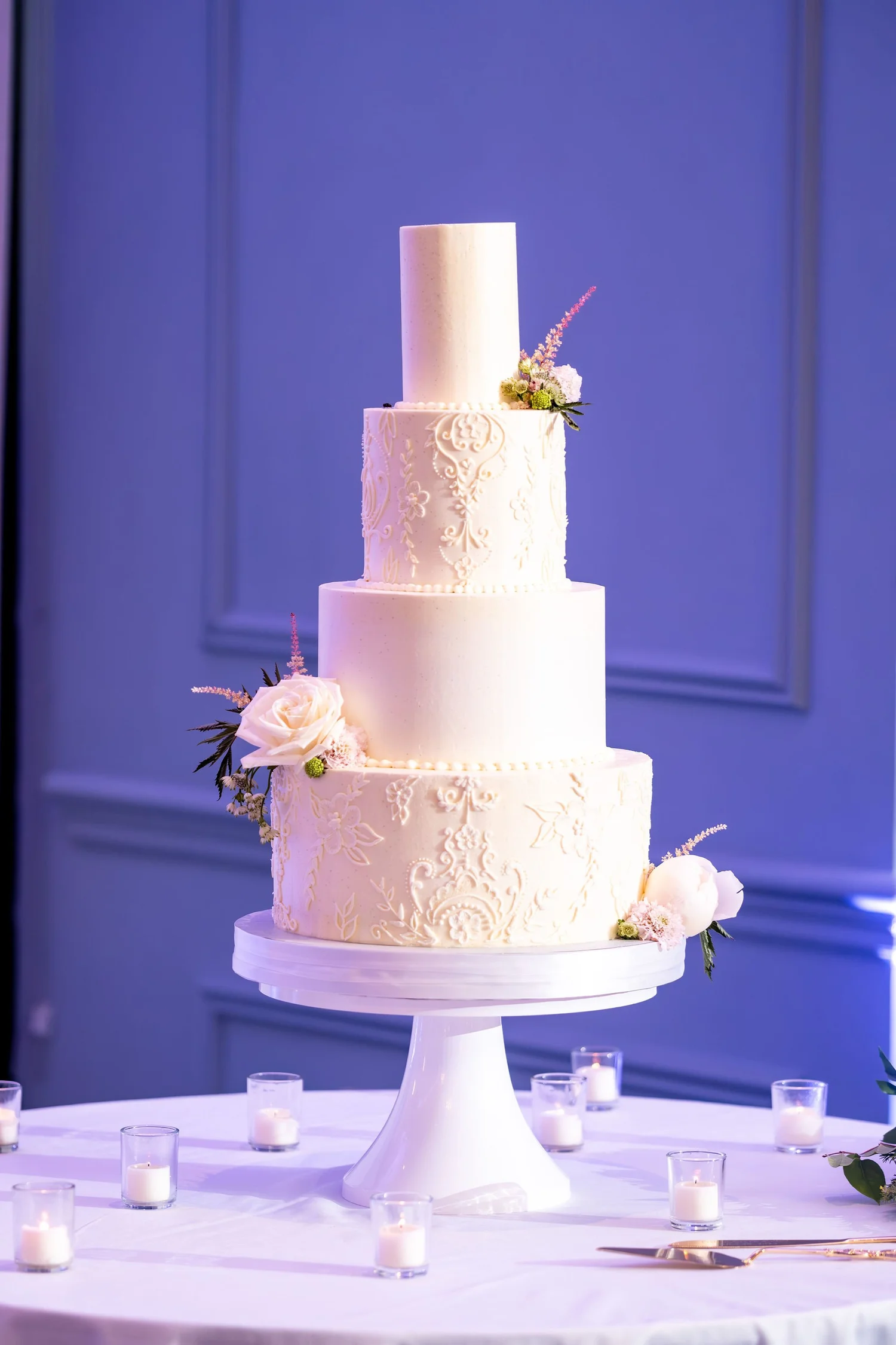 Nicole and Alexey's four tier wedding cake with piped lace detail at Portland Sheraton at Sable Oaks South Portland Maine summer wedding photography VMG Productions