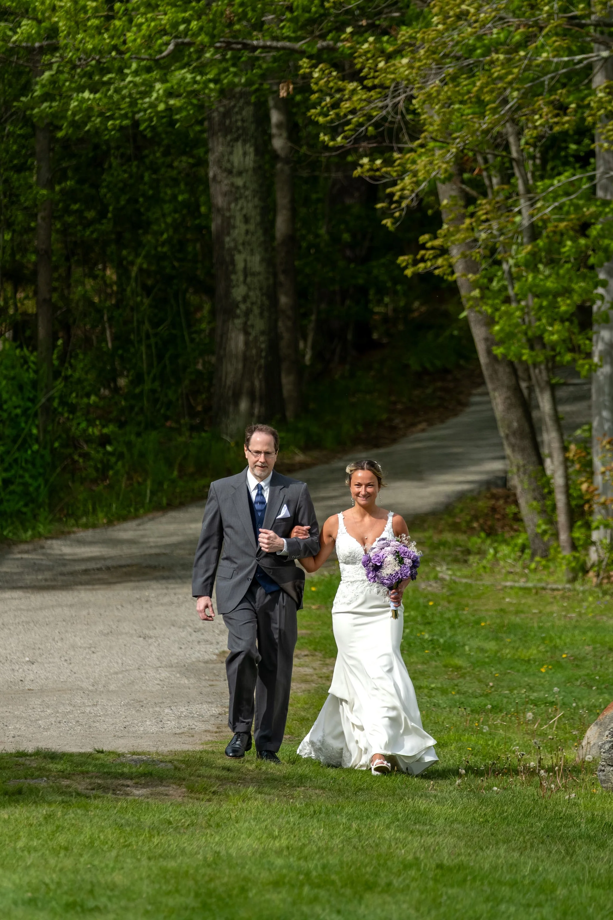 Beth and Cameron bride walking in with her father before the ceremony at Augusta Country Club Manchester Maine spring wedding photography VMG Productions