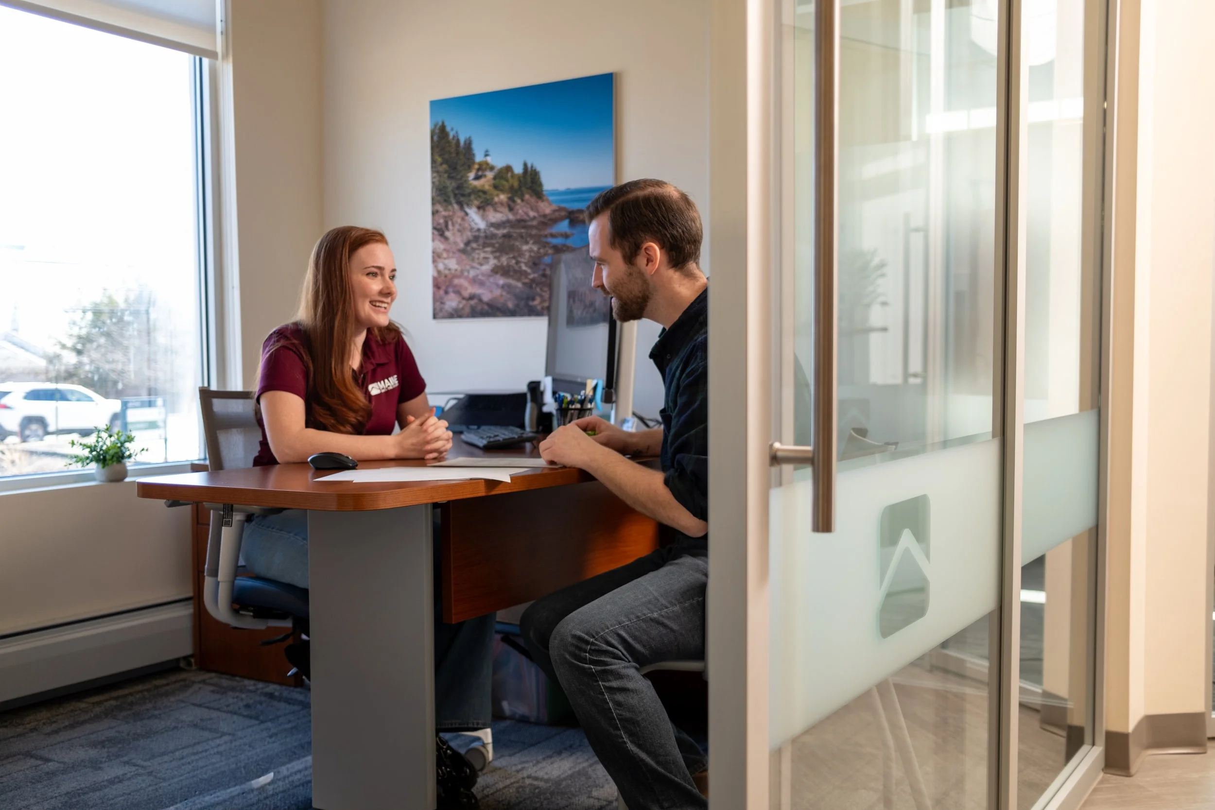 Loan officer meeting with a member