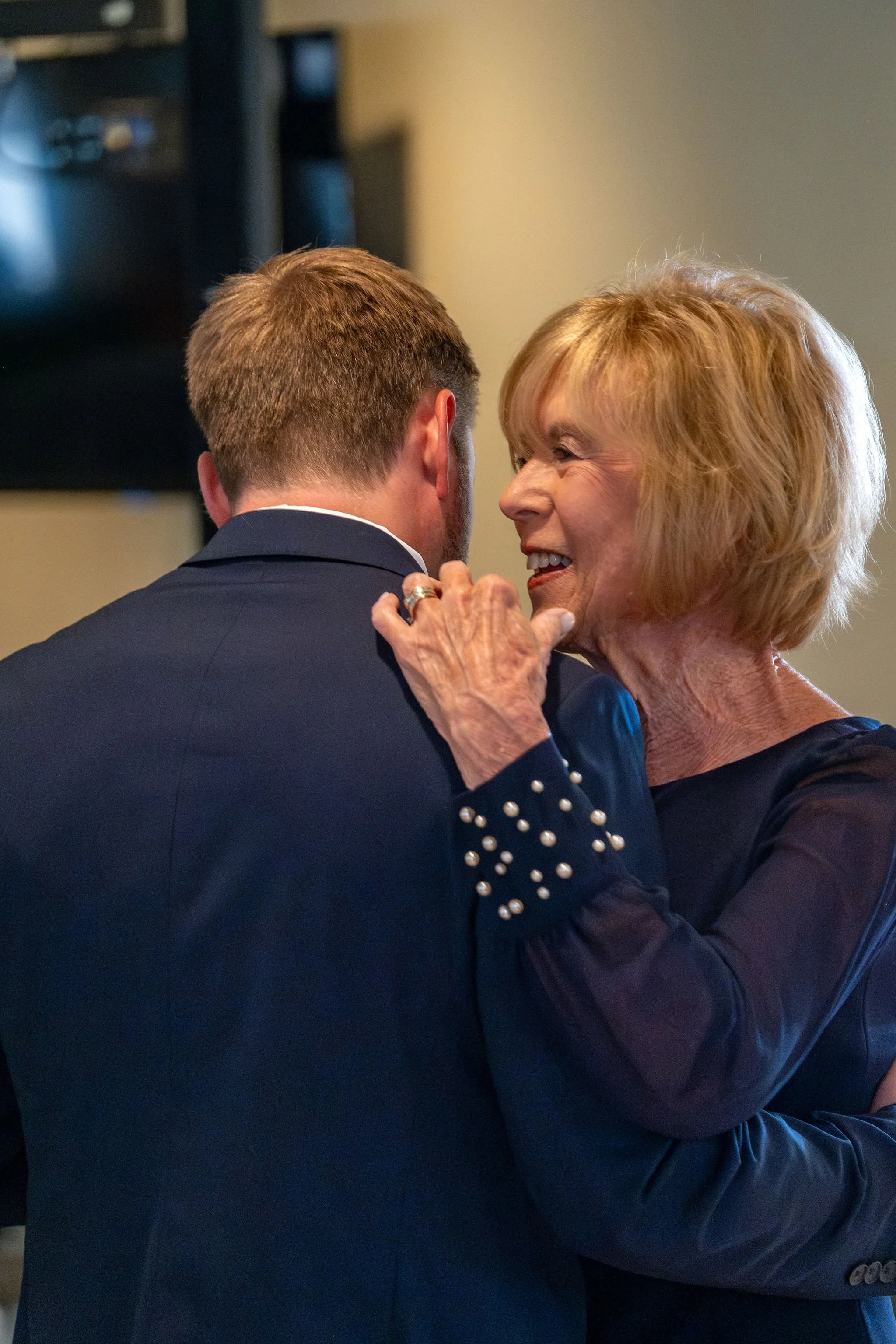 Beth and Cameron bride and groom's grand entrance into the reception at Augusta Country Club Manchester Maine spring wedding photography VMG Productions