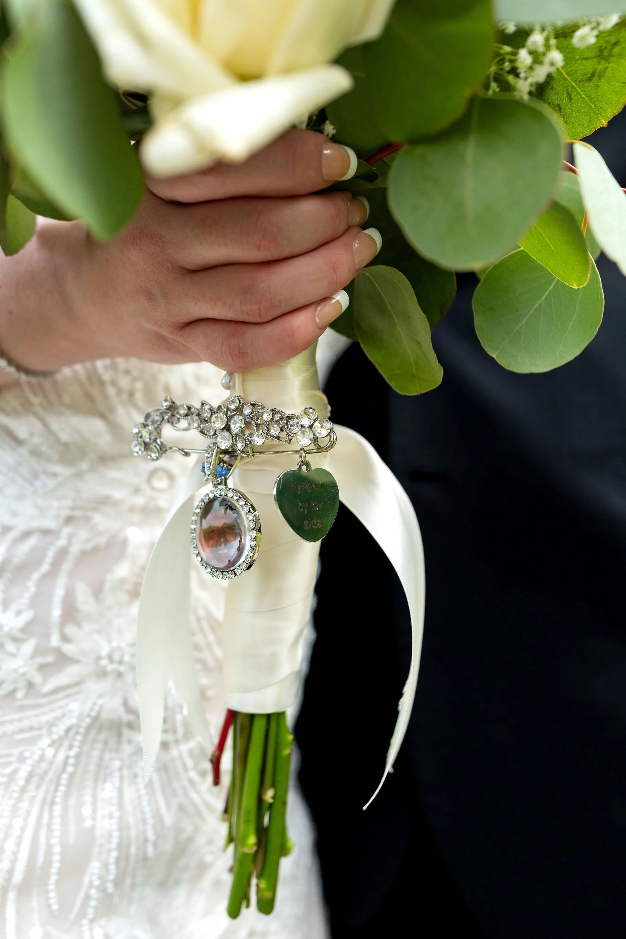 Kayla DeAngelis bouquet memorial charm with photograph and forever by my side heart at their Sanbornton New Hampshire wedding photography VMG Productions