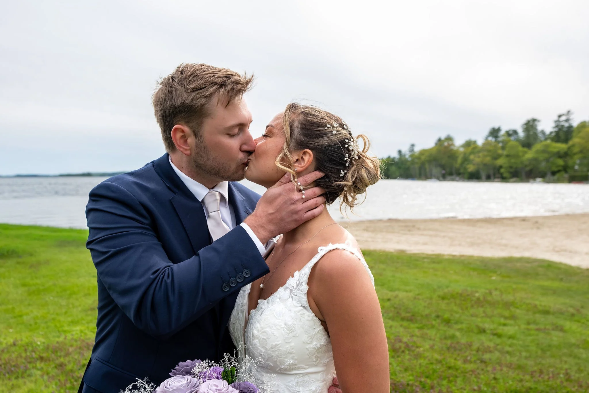 Beth and Cameron wedding party portrait by the lake at Augusta Country Club Manchester Maine spring wedding photography VMG Productions