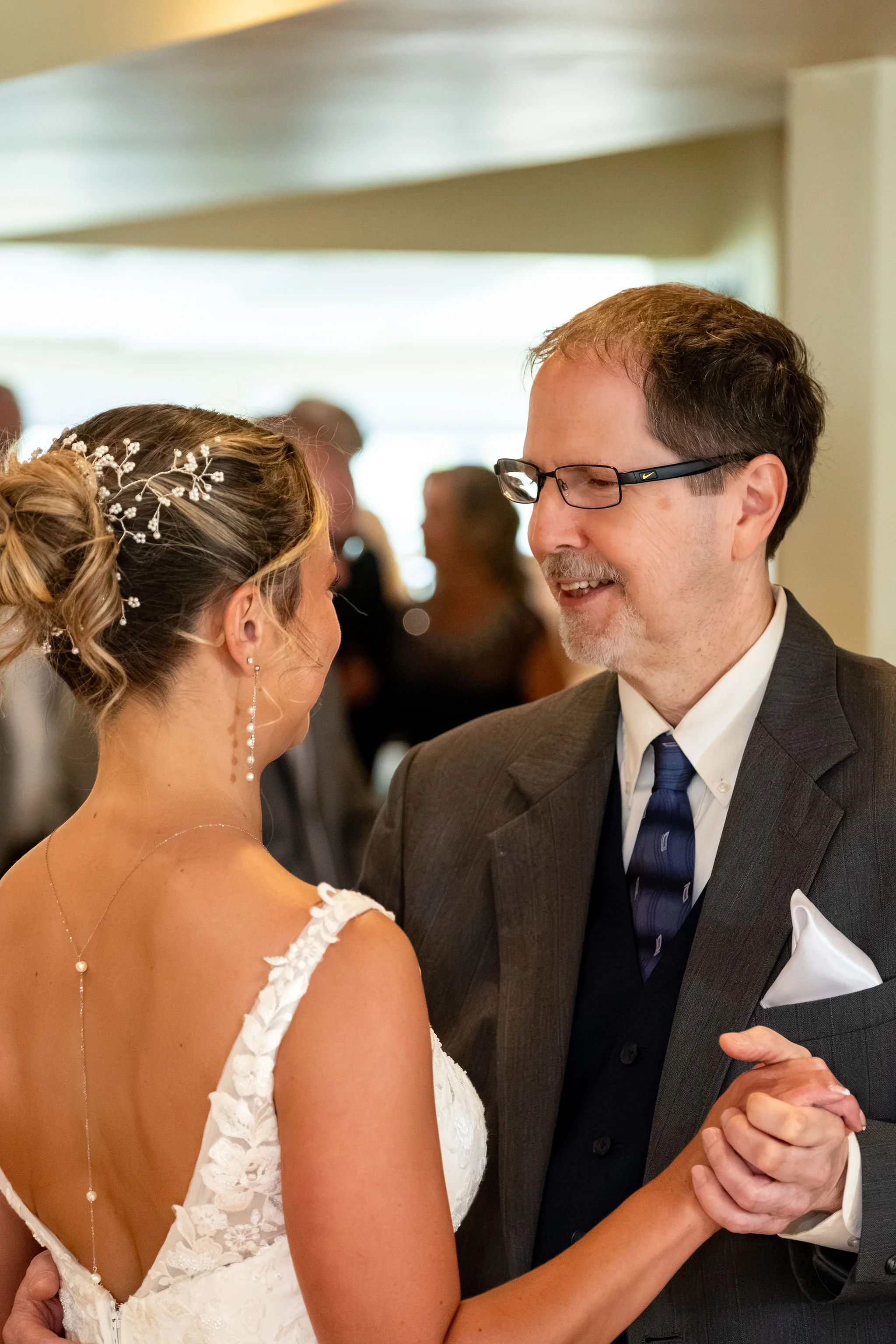 Beth and Cameron bride dancing with her father at the reception at Augusta Country Club Manchester Maine spring wedding photography VMG Productions