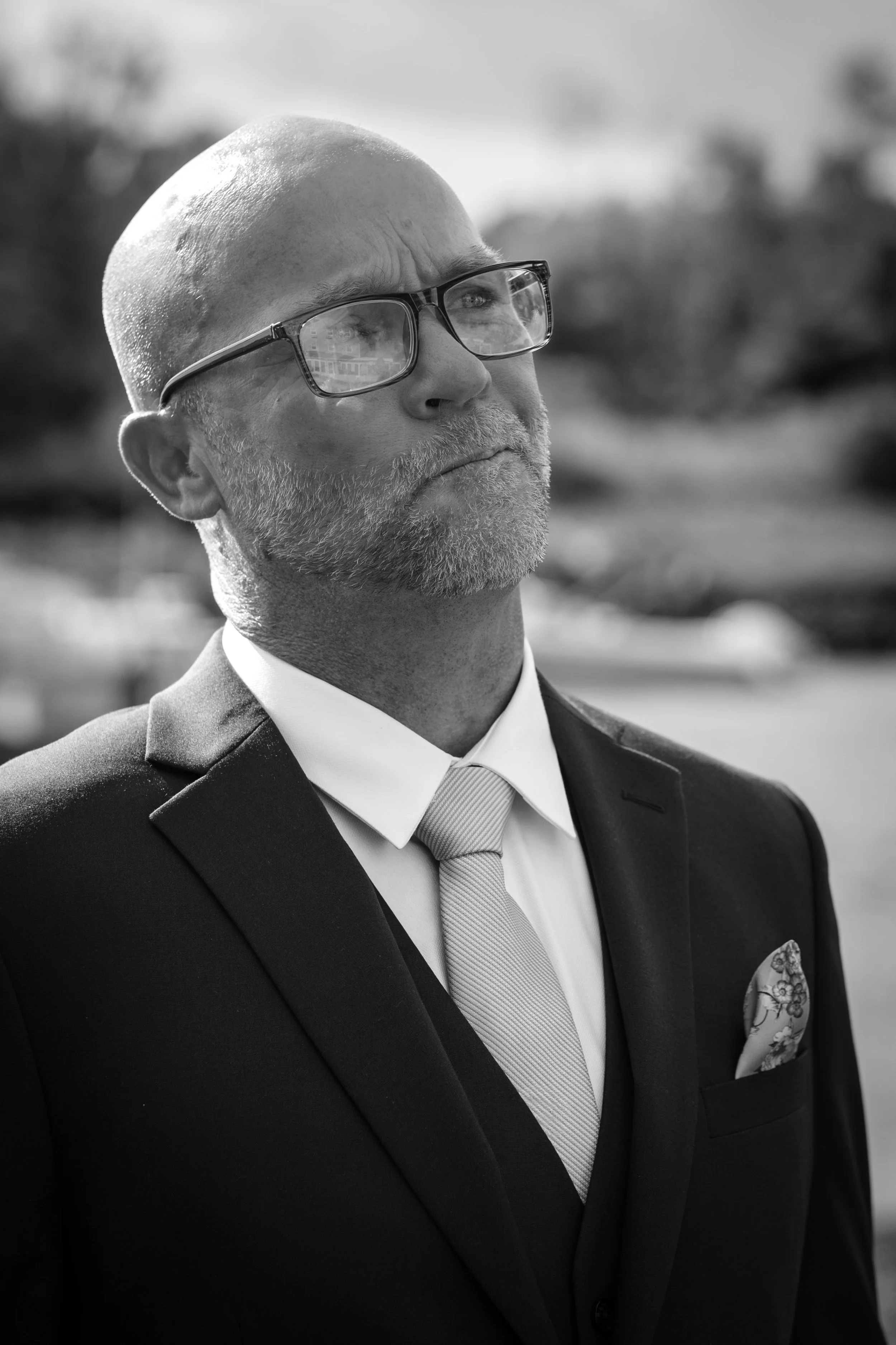 Marc Draper holding back tears as Ashley comes down the aisle in black and white at The Breakwater Inn in Kennebunkport Maine summer wedding photography VMG Productions