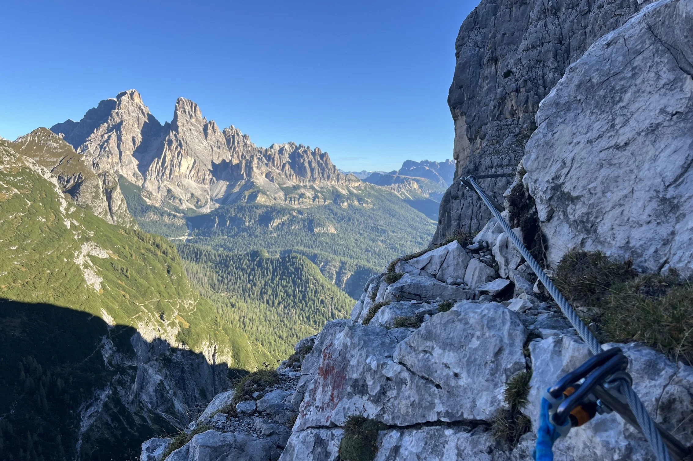 Exposed climbing on Ferrata Vandelli above Lago di Sorapis