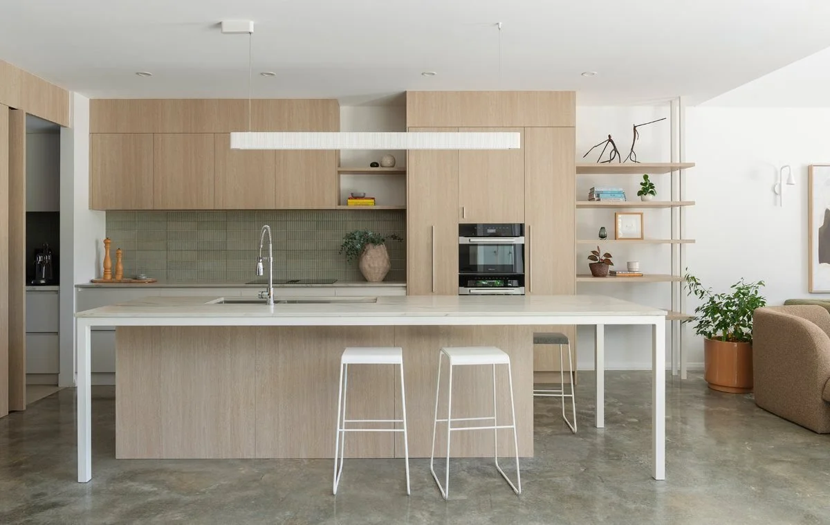 Finished kitchen with timber joinery and island bench