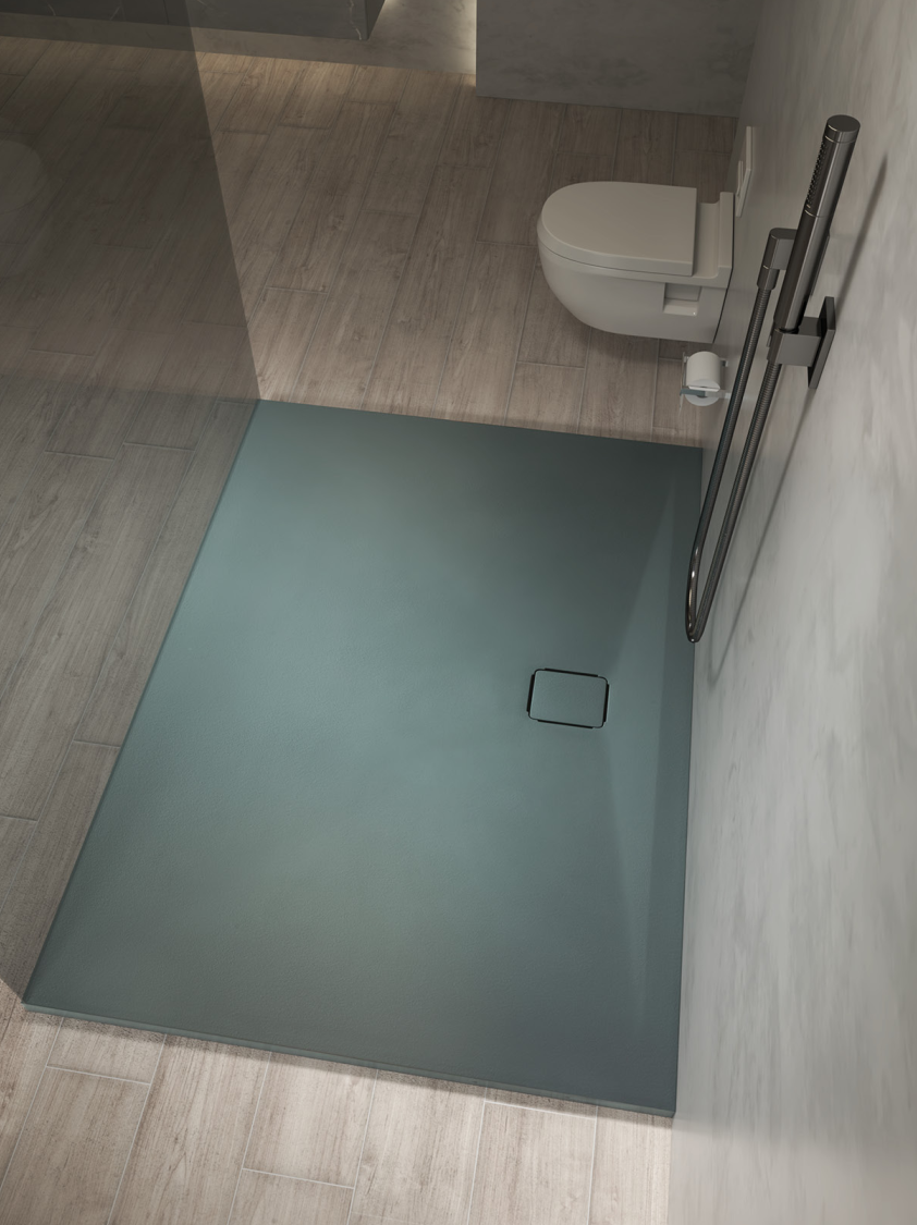 Textured shower tray in a space-efficient residential bathroom