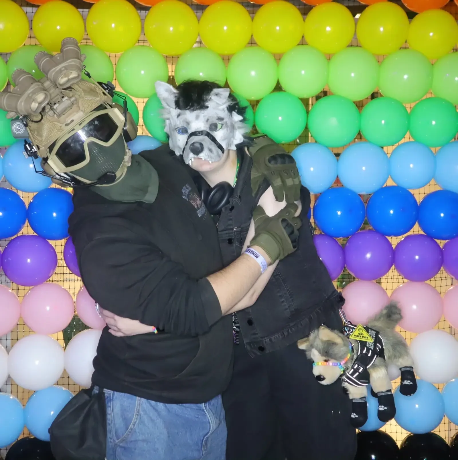 Queer Formal guests in detailed costumes posing at the Pride Balloon Wall photo booth in Melbourne