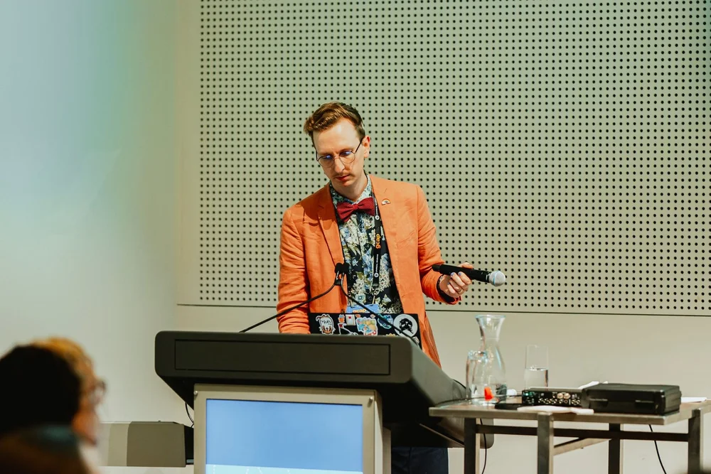 Speaker presenting a GCAP Conference session in Melbourne