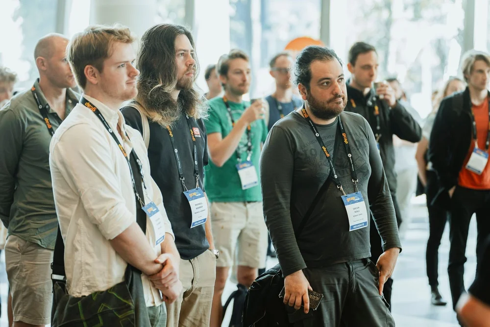 Delegates networking during a GCAP Conference break in Melbourne