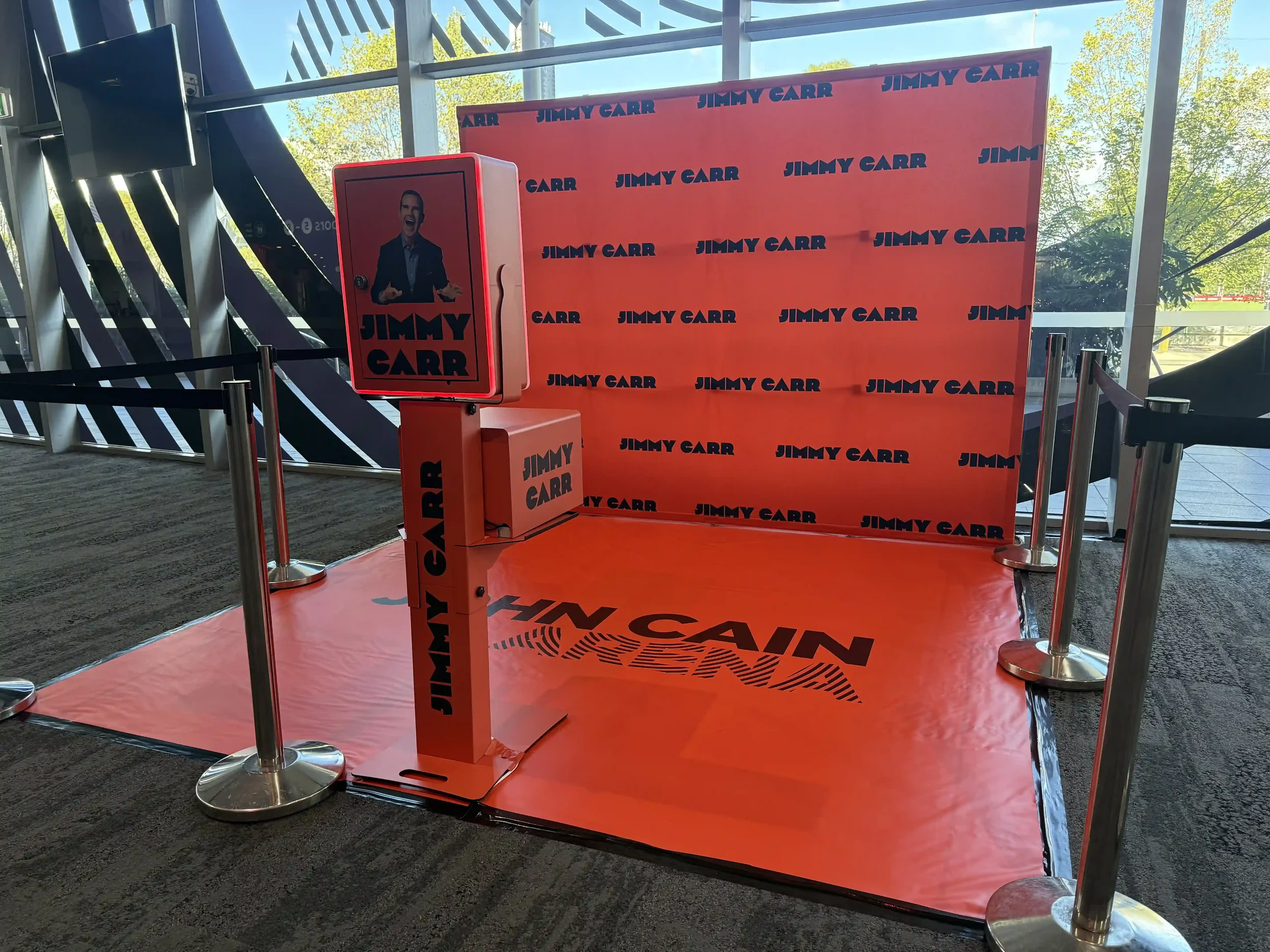Experiential brand activation photo booth setup at John Cain Arena