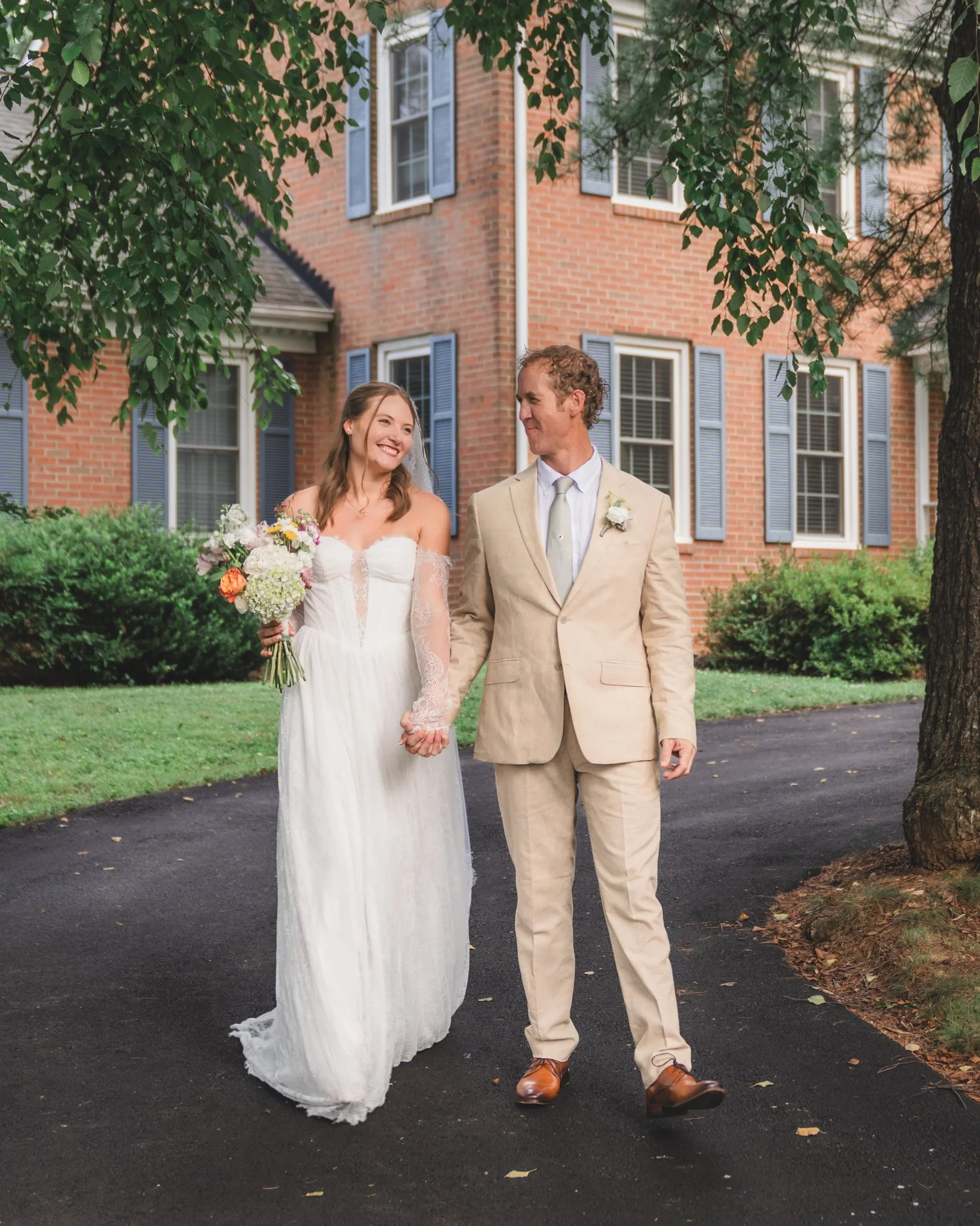 Bride and groom walking hand in hand