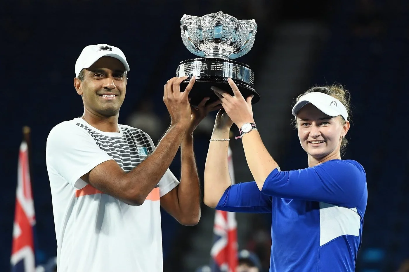 Rajeev Ram and Barbora Krejcikova with the Australian Open mixed doubles trophy