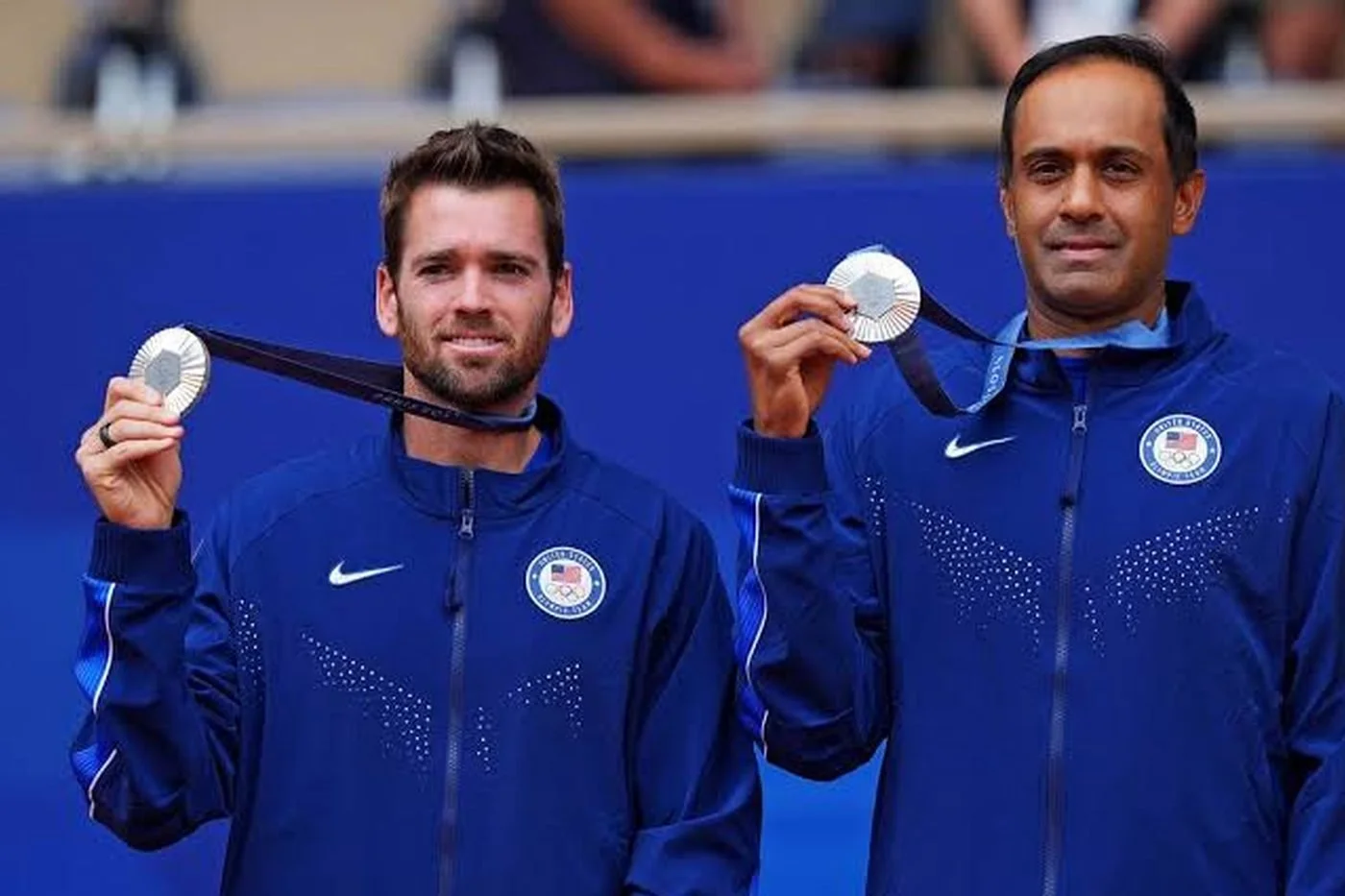 Austin Krajicek and Rajeev Ram with their Olympic silver medals in Paris