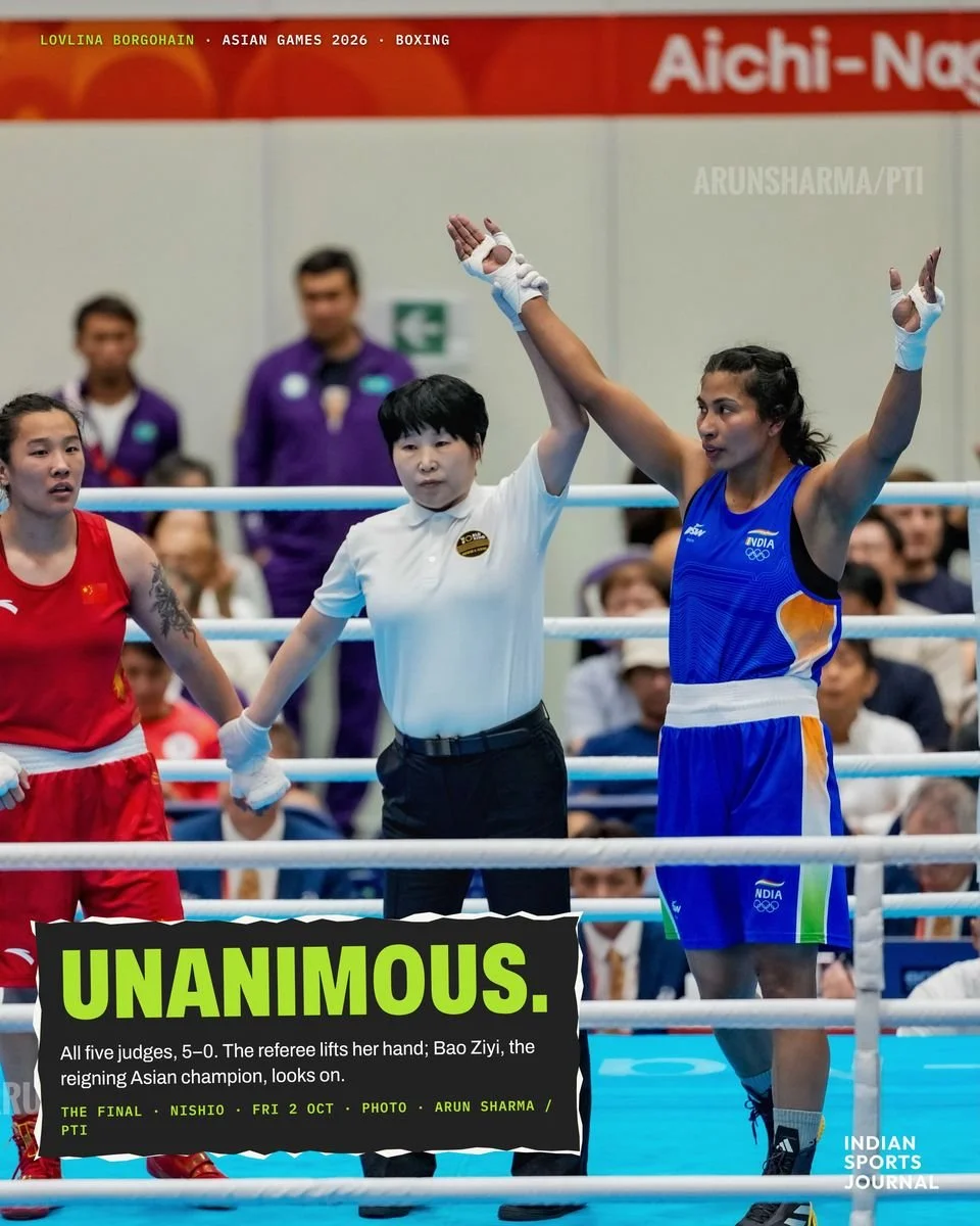 ISJ slide: the referee raises Lovlina Borgohain’s hand after the 75kg final as Bao Ziyi looks on