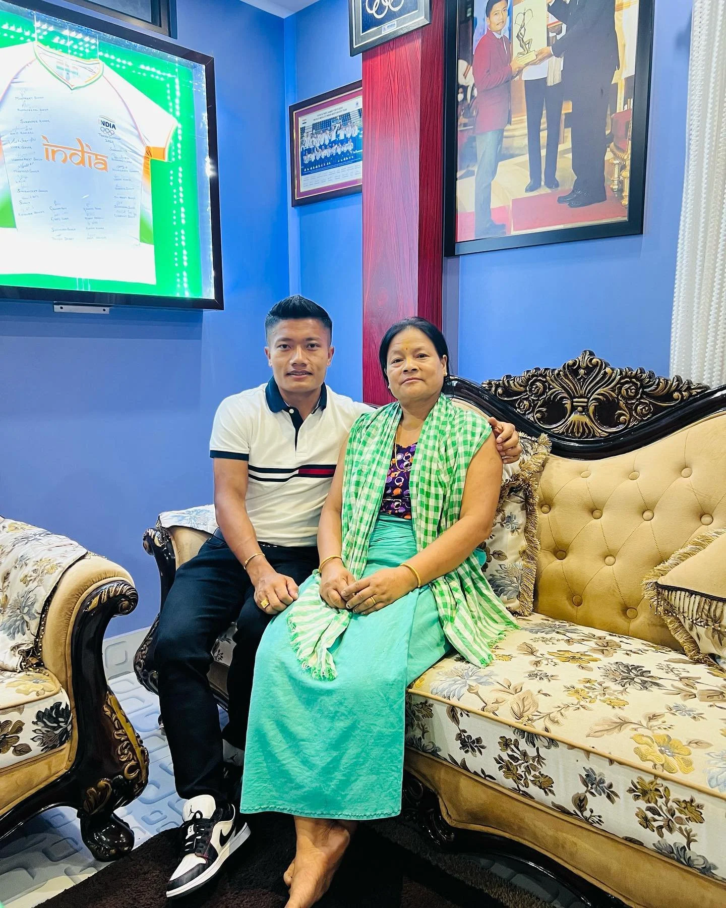 Nilakanta Sharma at home in Imphal East with his mother