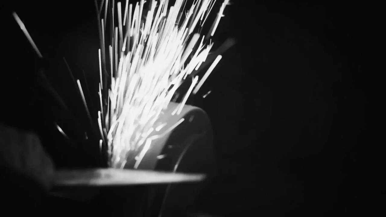 Frame 7 of 14: Sparks rising from the wheel