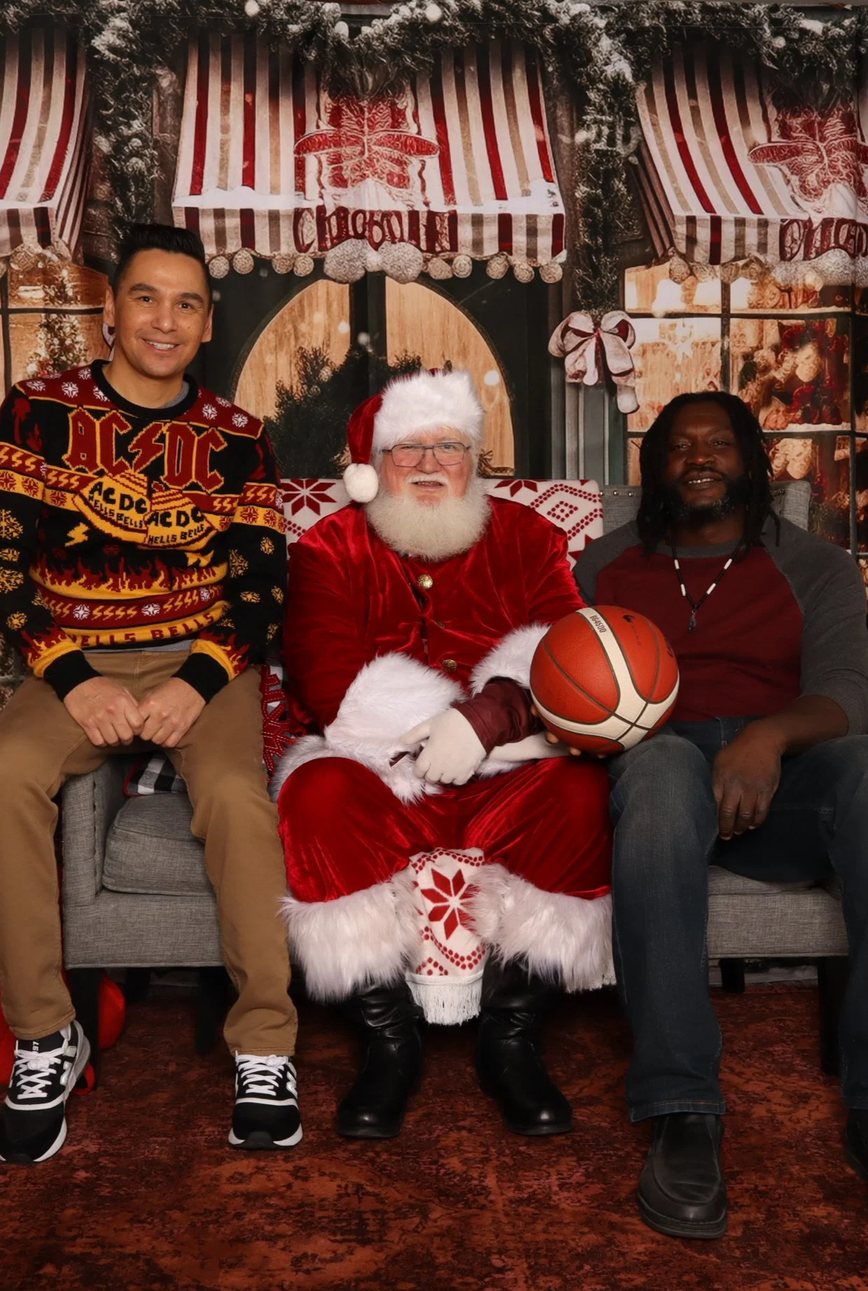 Free Santa photo station at Oakwyn Realty Kelowna during Junior Coyotes event