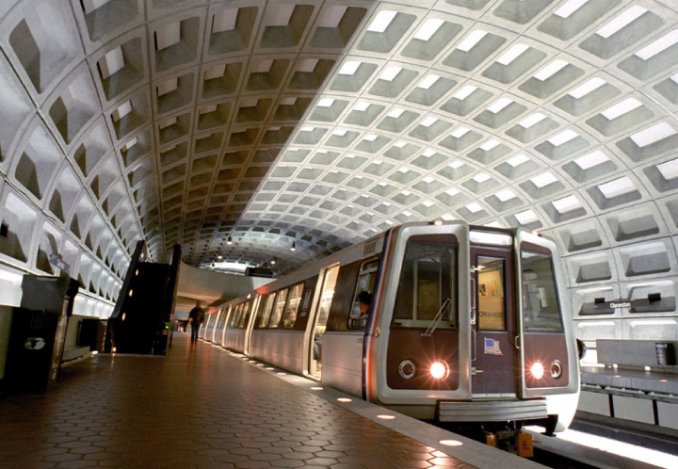 Washington Metropolitan Area Transit Authority WMATA Washington, DC A train approaches the station, ready to stop and allow passengers to board and disembark.