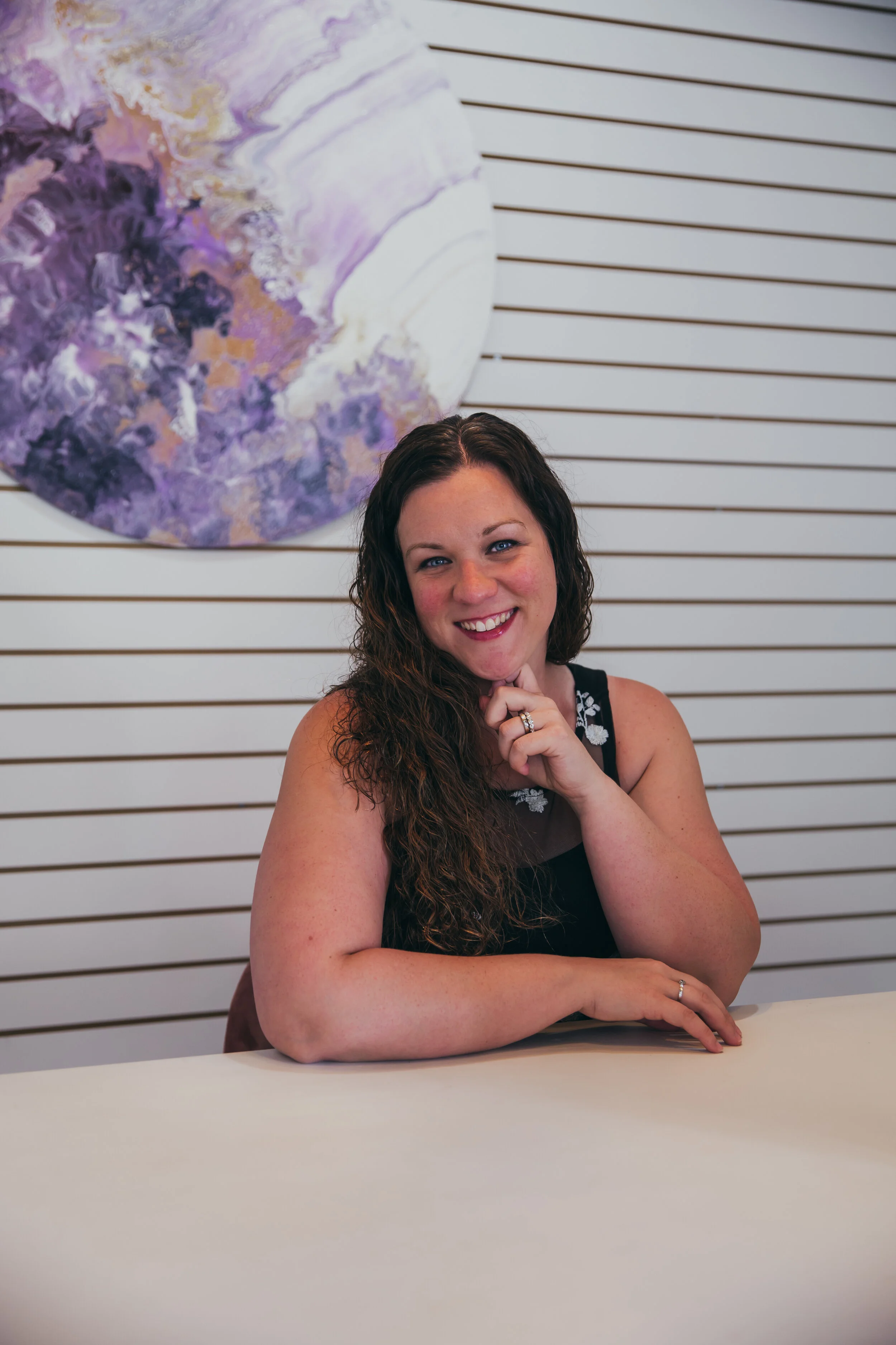 Lisa Gabriel smiling at a table