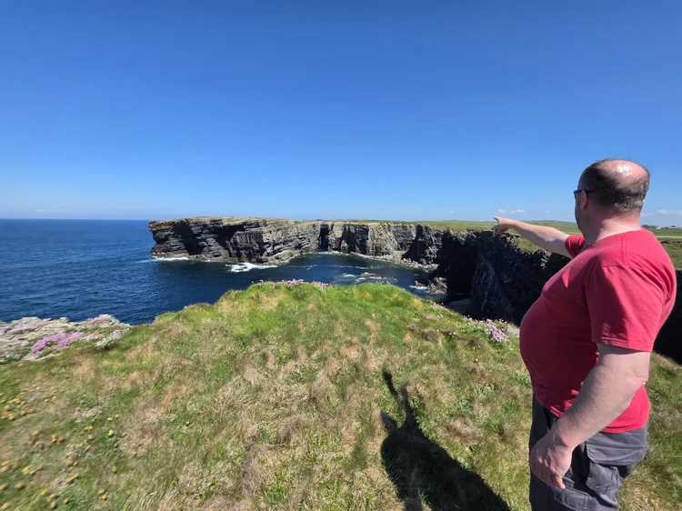 Atlantic cliffs vista with blue sea