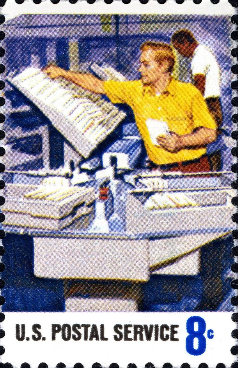A vintage postage stamp showing mail being sorted into boxes