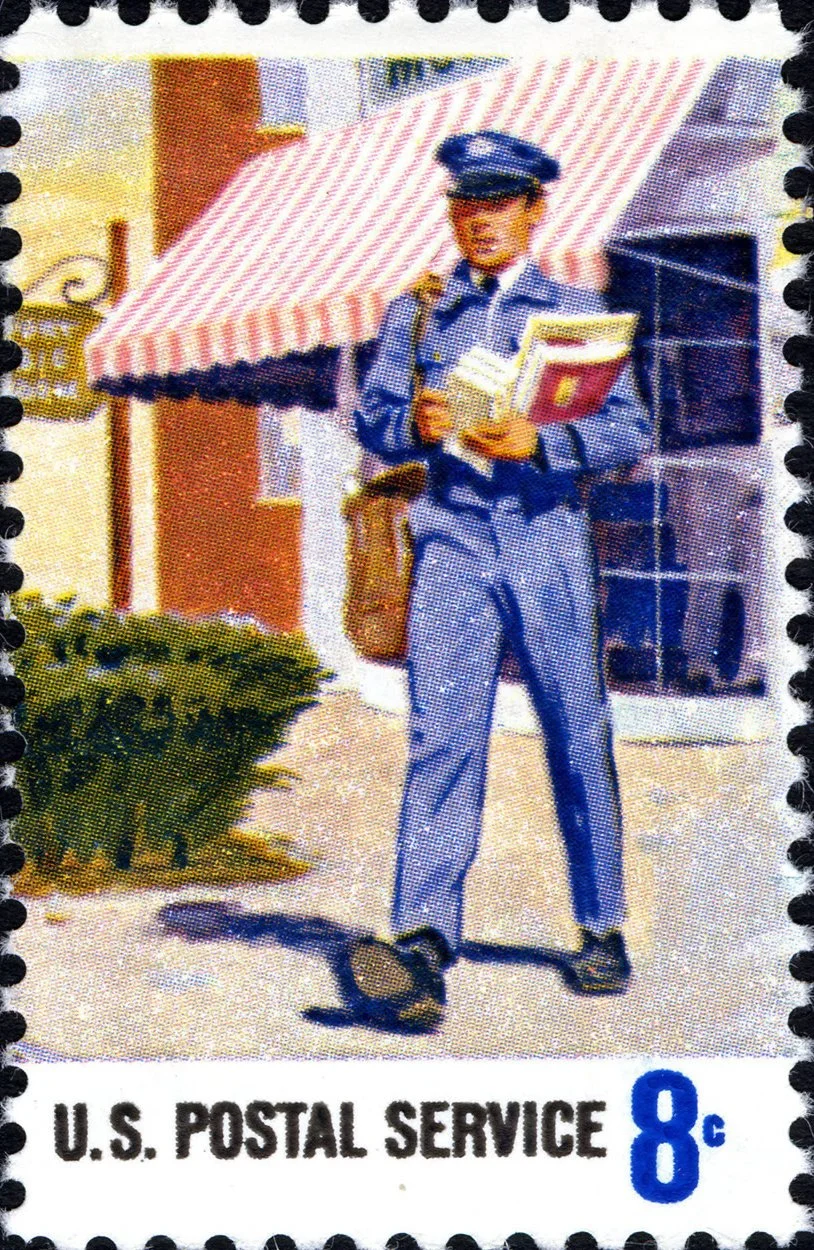 A vintage postage stamp showing a postage worker carrying mail to a house