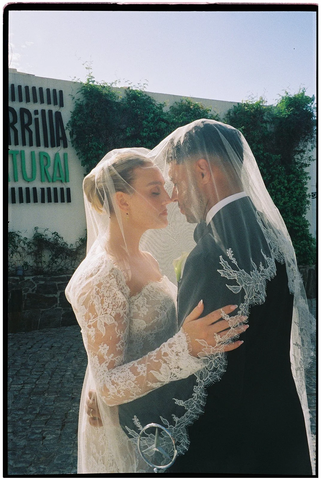 An intimate film portrait of Perrie and Alex beneath the veil
