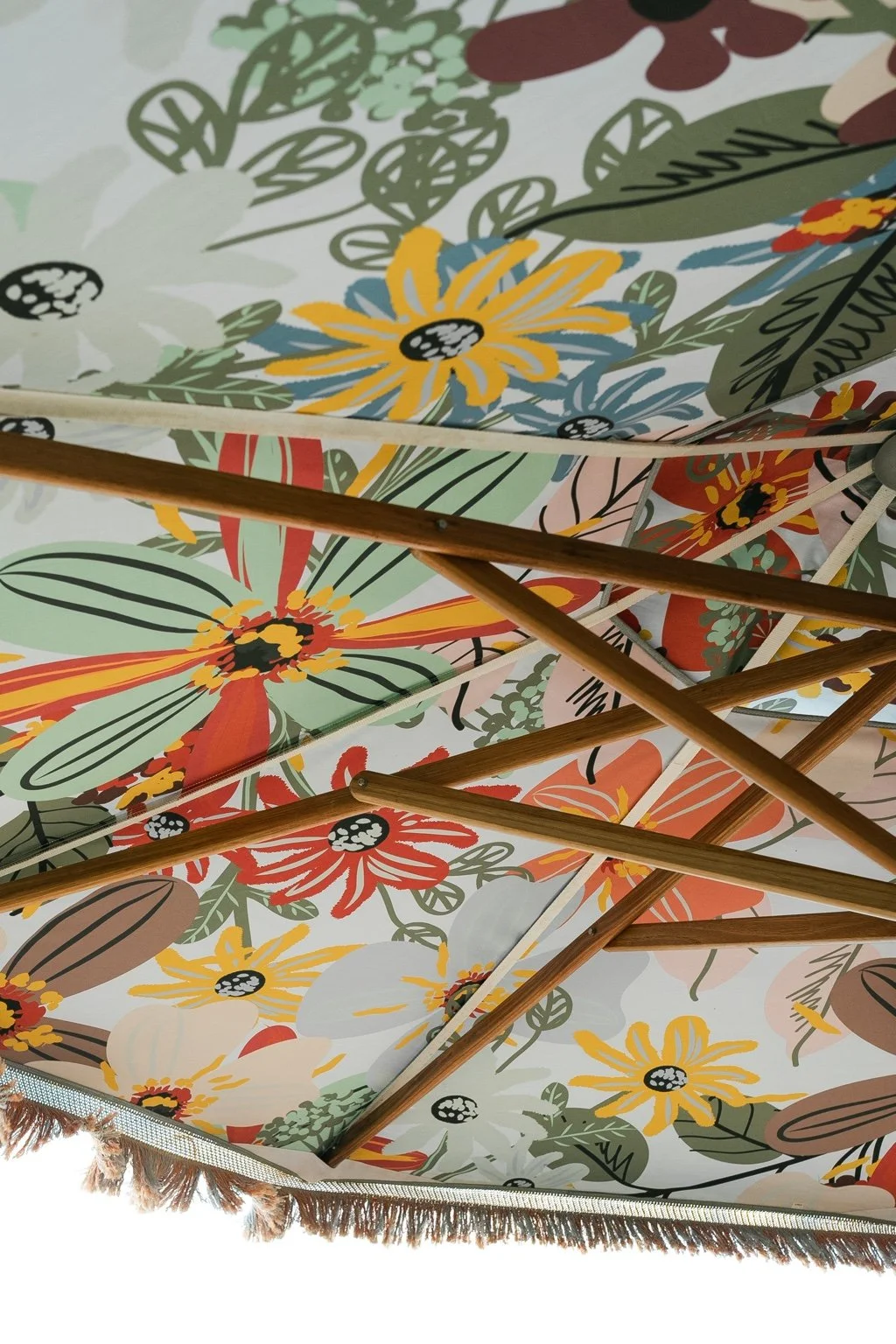 Colourful floral pattern on a parasol at the welcome gathering.