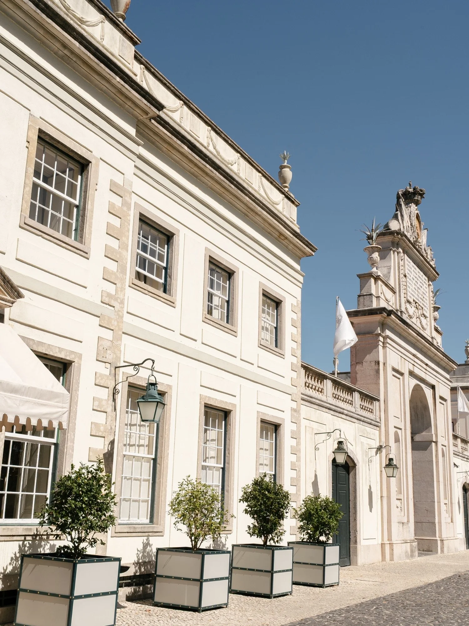 Sunlit façade and windows of Valverde Sintra Palácio de Seteais