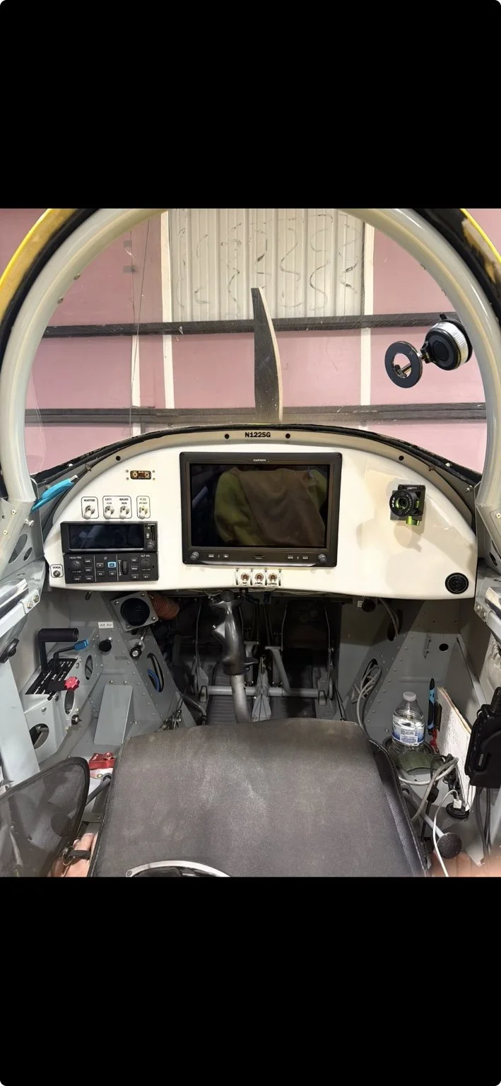 RV-8 cockpit front view with centered EFIS and left-side radios