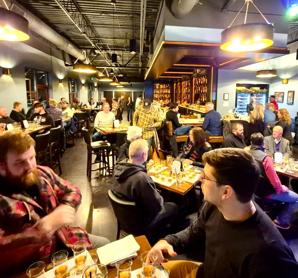 Bin 110 bourbon and whiskey bar in Cornelius, NC — upscale but not pretentious, hosting an exclusive guided Dalmore Scotch tasting and cigars on the patio.