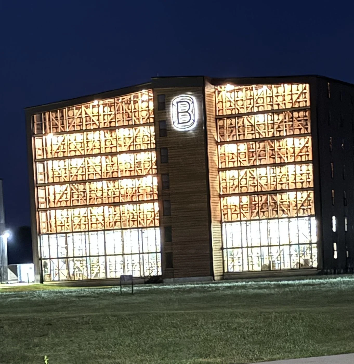 Bardstown Bourbon Company distillery lit up at night during Kentucky Bourbon Festival week.
