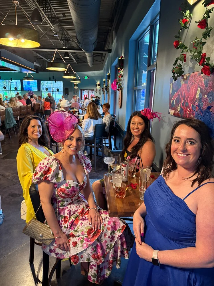 Packed house at Bin 110 during the Kentucky Derby Party with guests in Derby attire