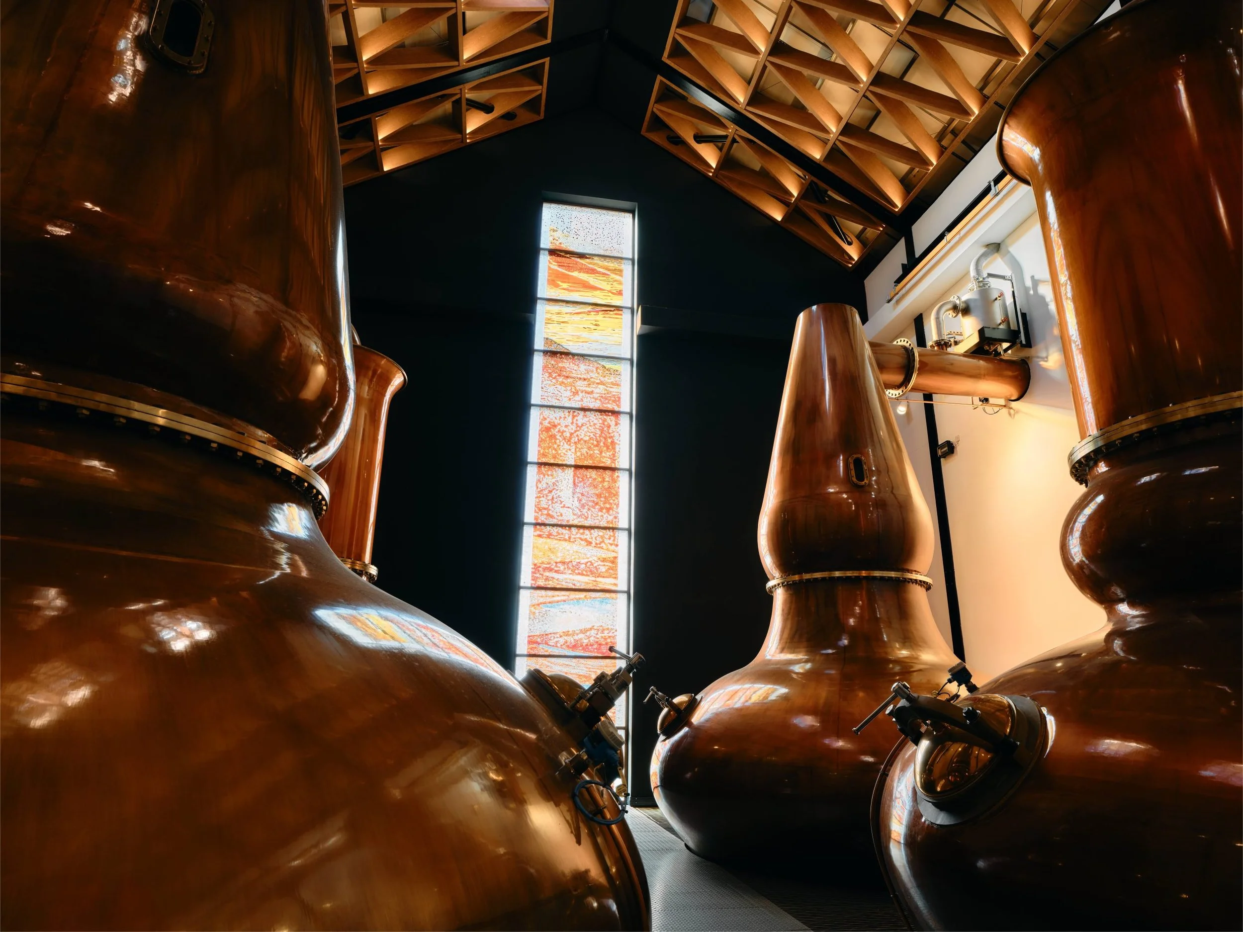 The Dalmore distillery on the Cromarty Firth — distilling Highland single malt Scotch whisky since 1839, featured at Bin 110's exclusive guided tasting in Cornelius, NC.