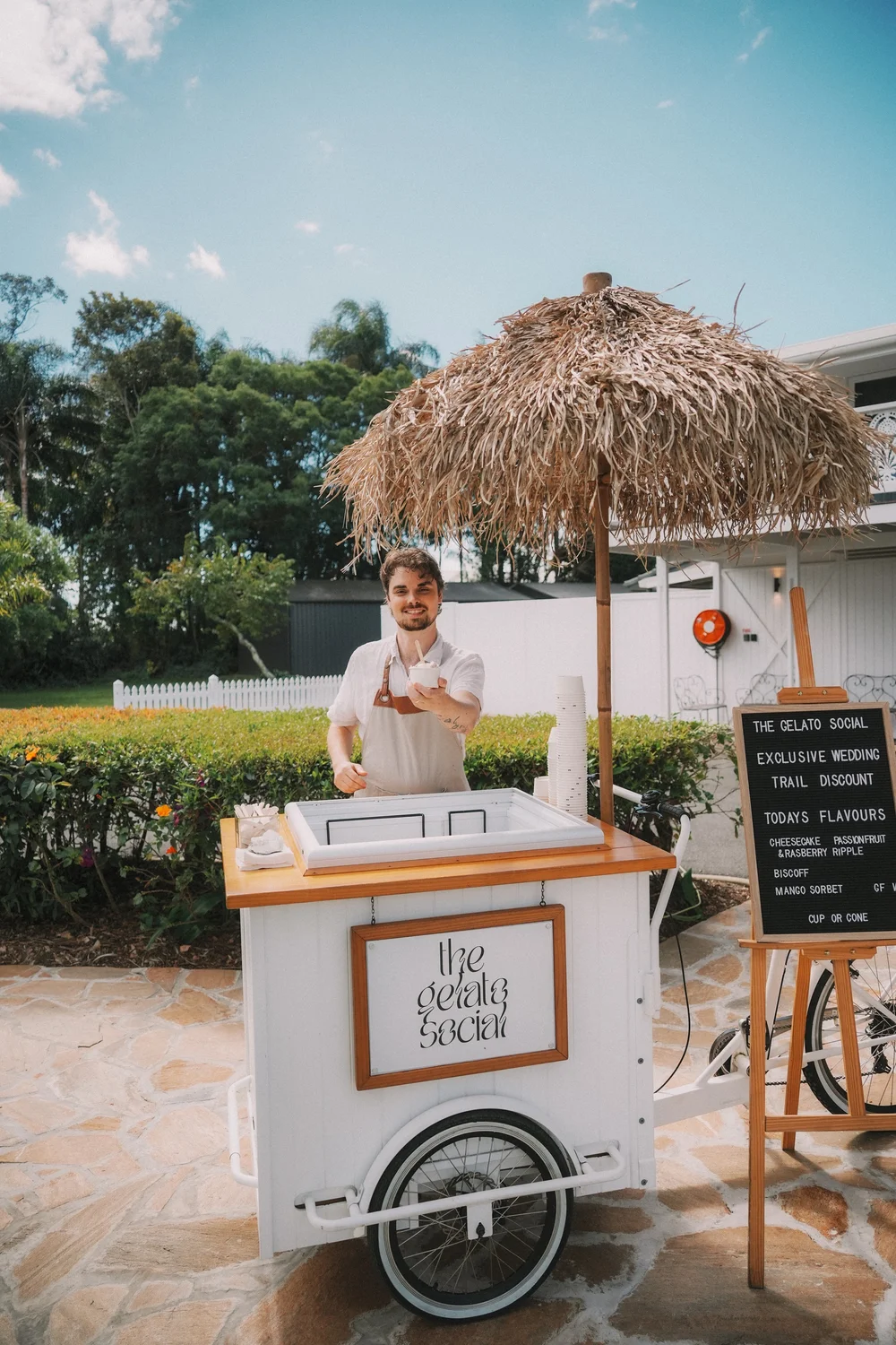 Florence serving gelato under her tiki umbrella