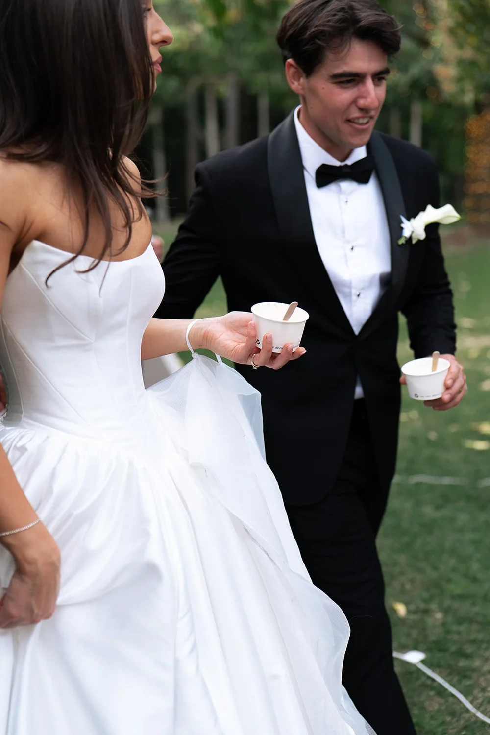 Bride and groom with cups of gelato