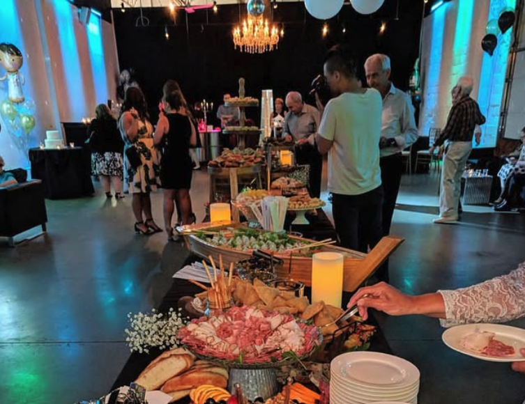 Wedding guests celebrating in a modern venue