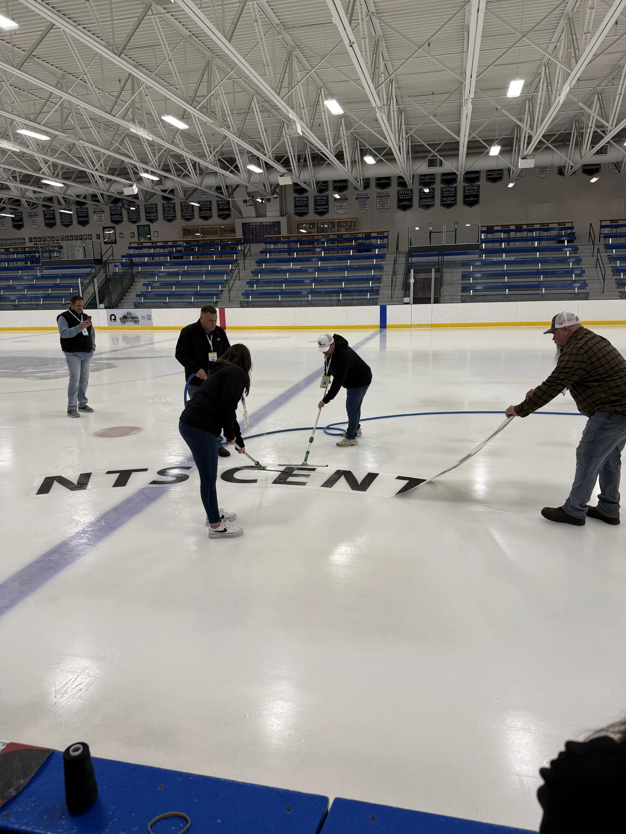 Fabric logo being laid on ice surface