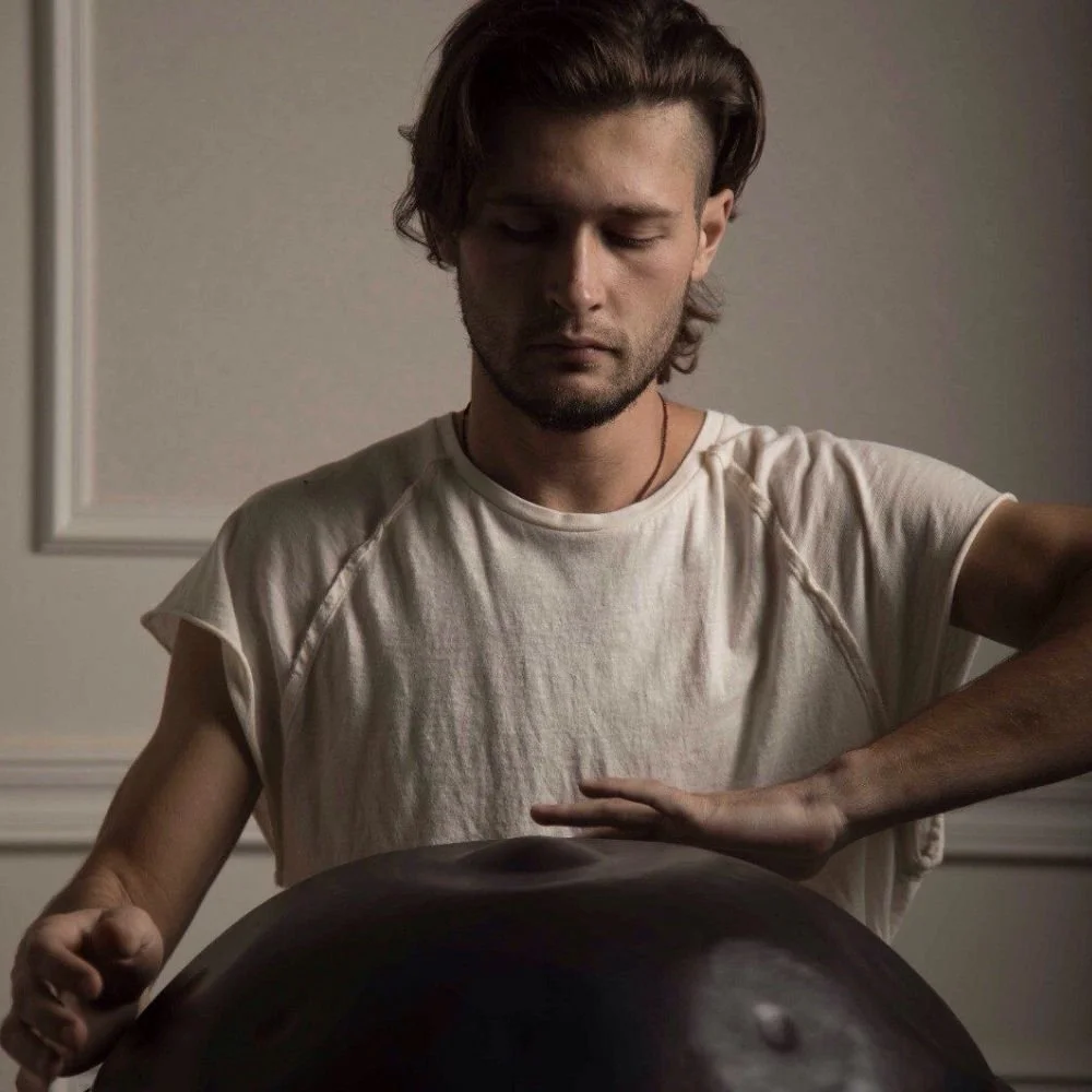 Sasha playing the handpan