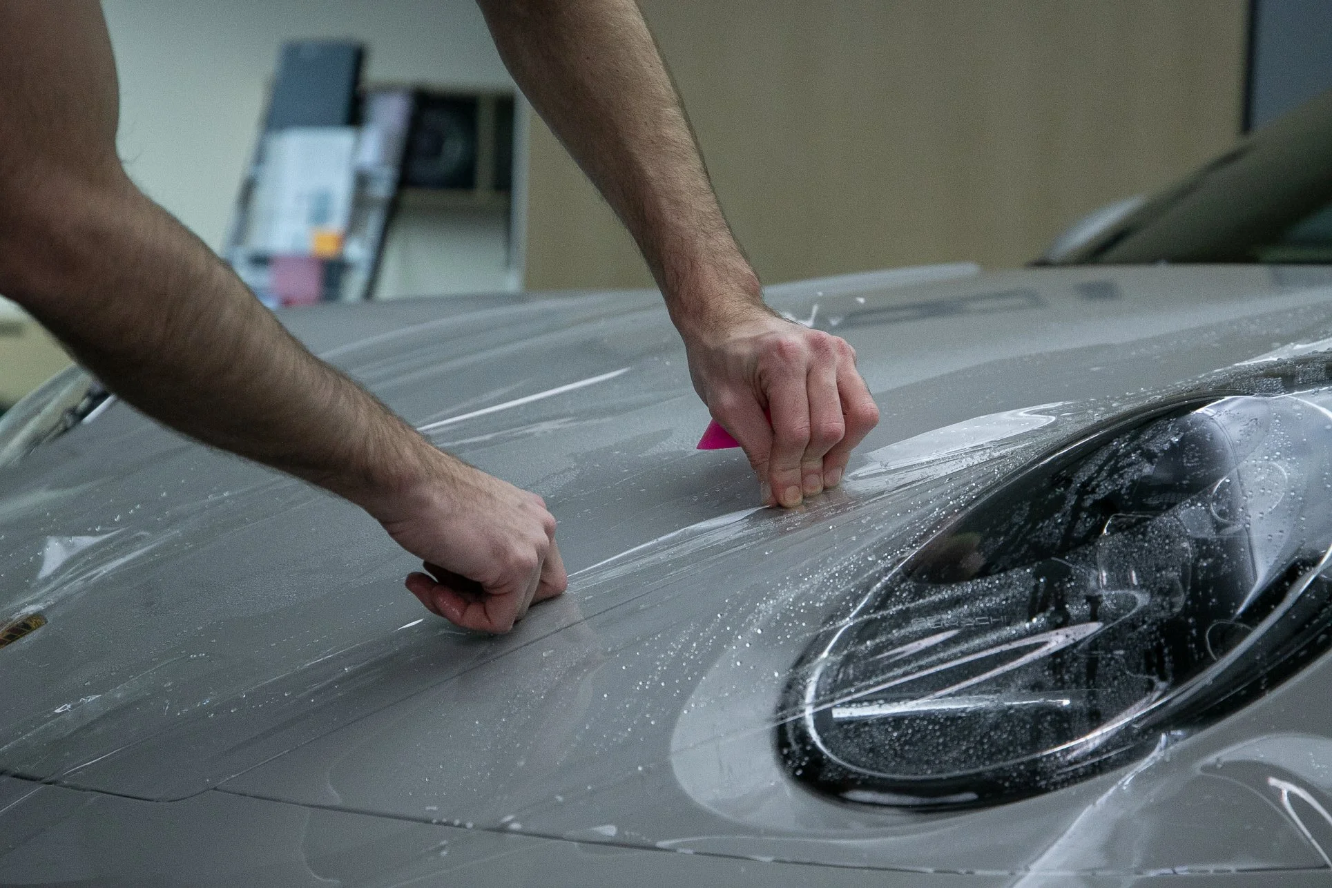 Paint protection film installation on a vehicle in Hamilton