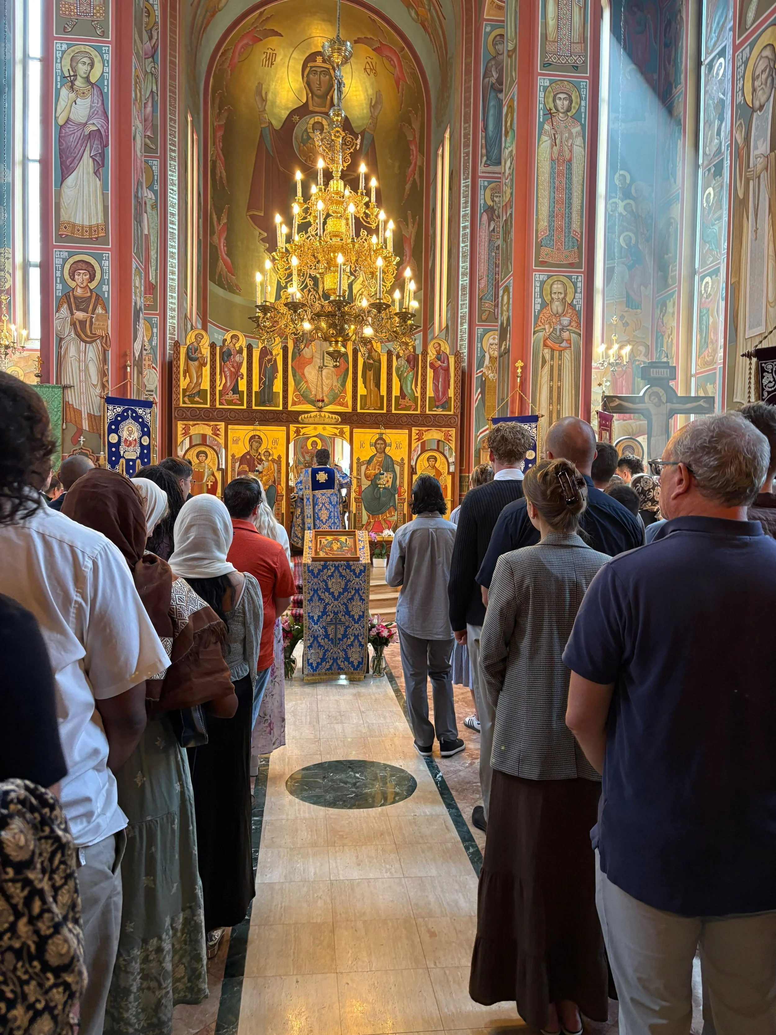 The faithful gathered for the Divine Liturgy beneath the icons of Saint Nicholas Orthodox Cathedral