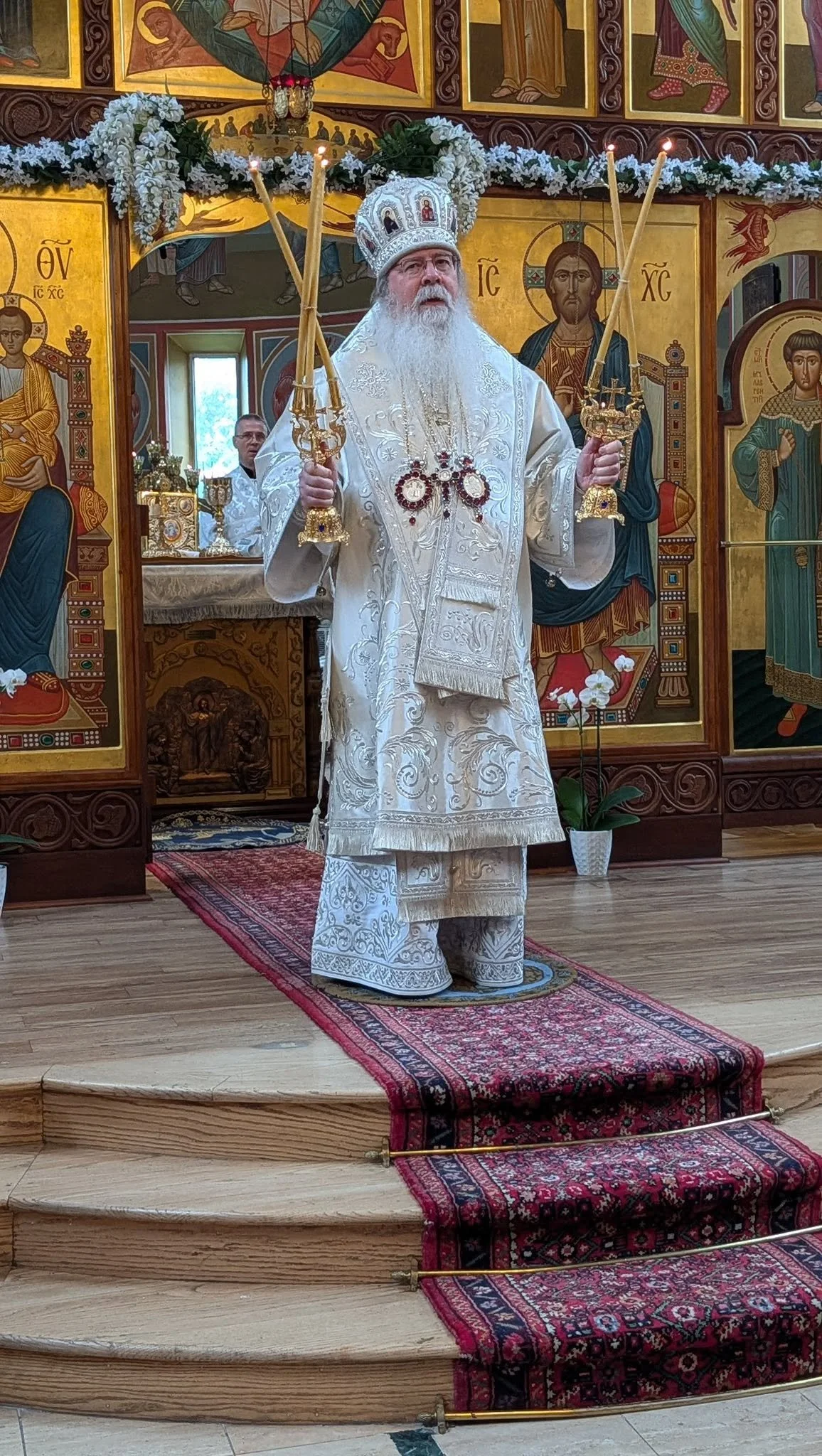 His Beatitude Metropolitan Tikhon standing before the Cathedral iconostasis
