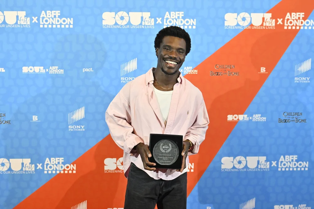 Michael Ahomka-Lindsay with his trophy at BFI Southbank