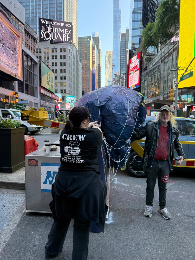 Balloons To Go team filling a giant inflatable in Times Square