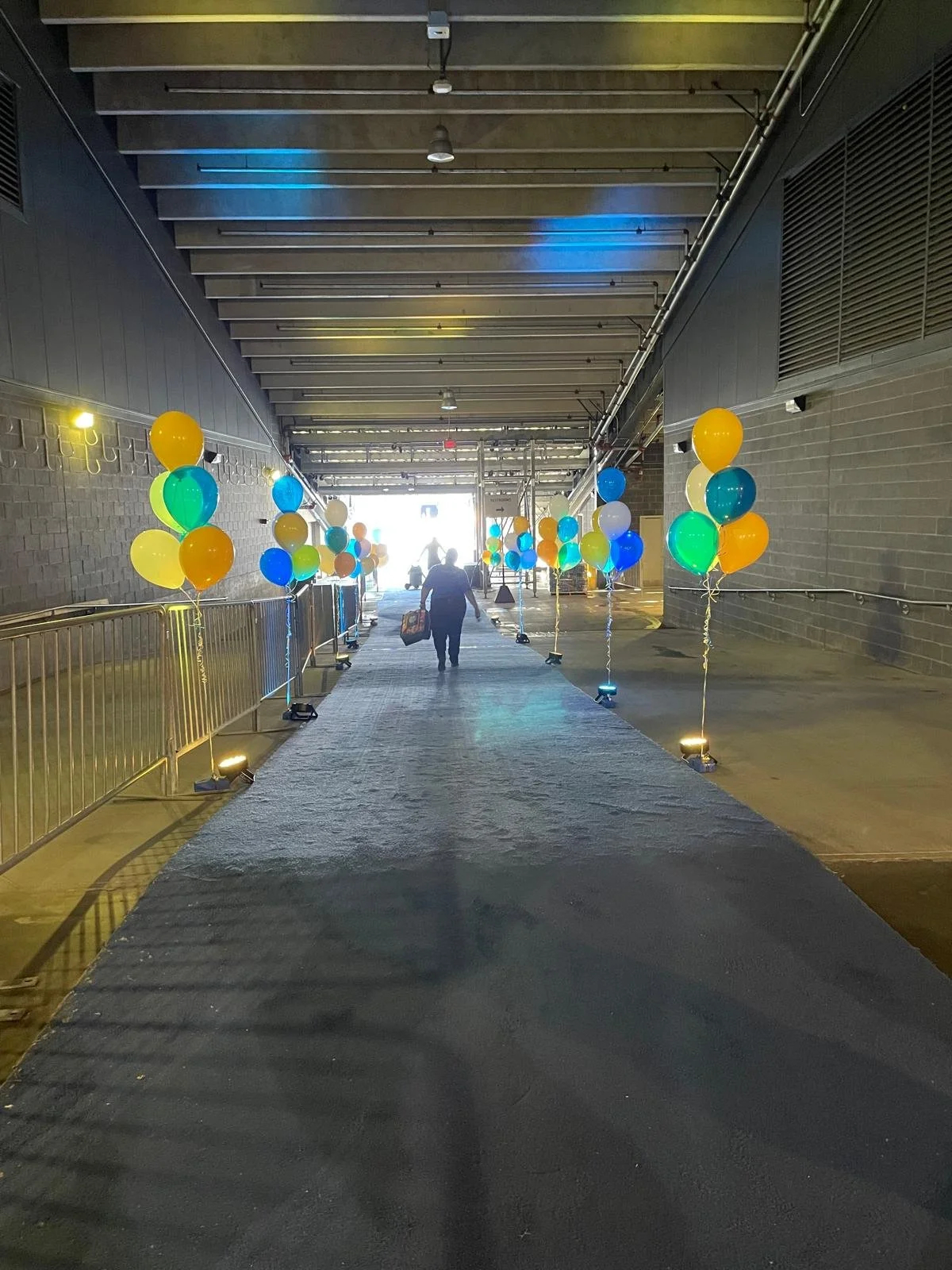 Graduation balloon clusters lining the entrance walkway at MetLife Stadium East Rutherford NJ