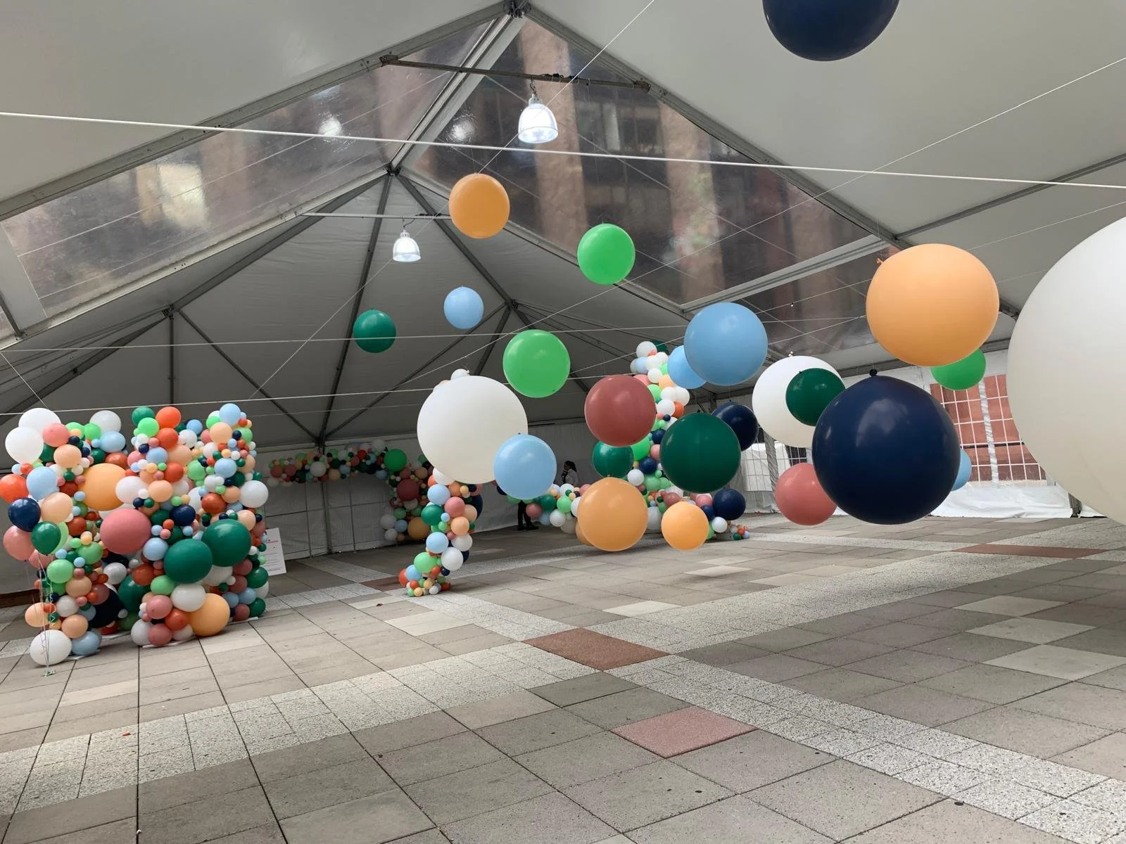 Balloon walls and suspended orbs in an immersive installation at NYU Greenwich Village Manhattan NYC
