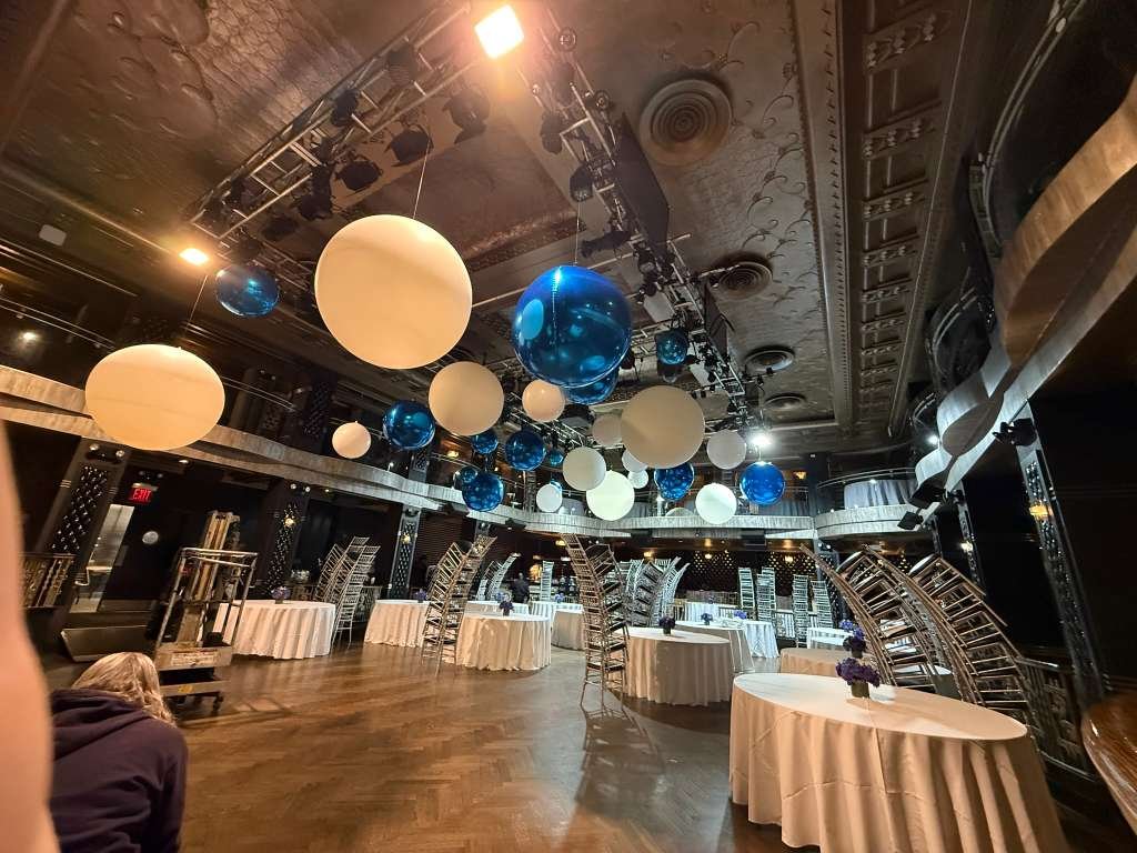 Wide view of orb balloon ceiling installation across Edison Ballroom Theater District Manhattan NYC