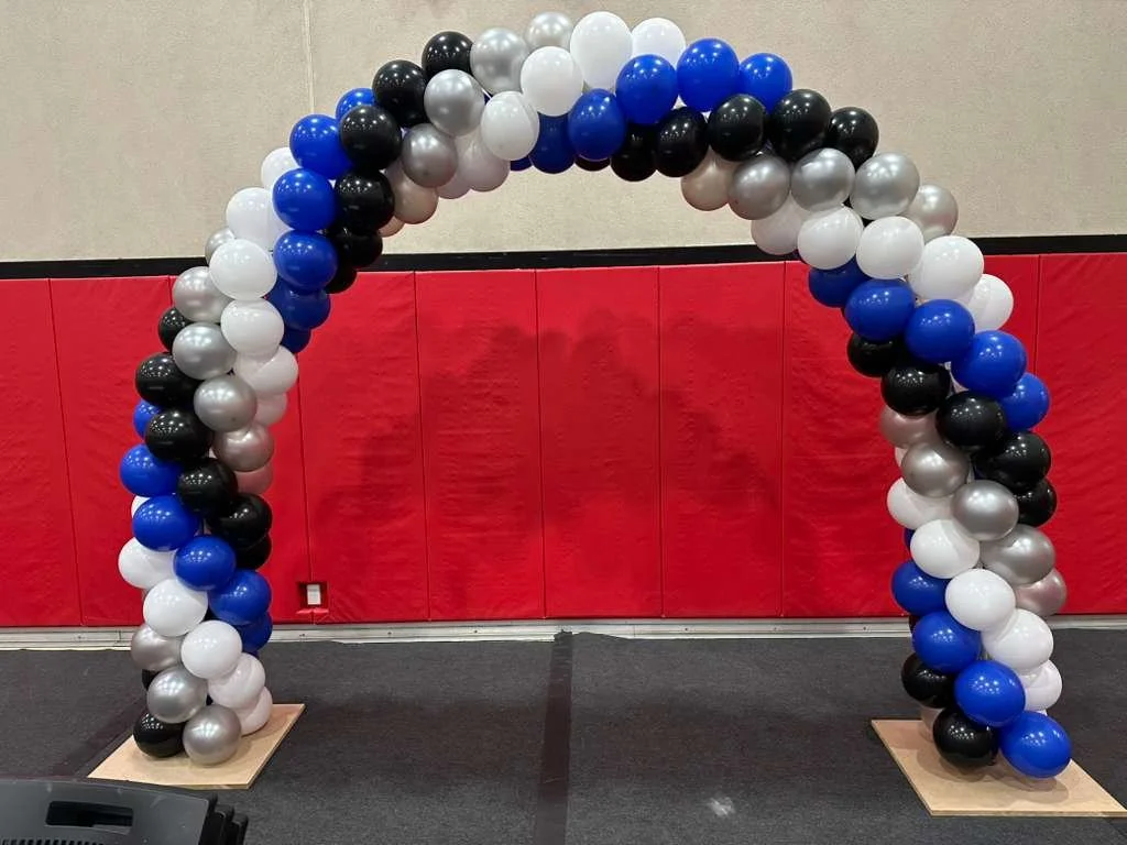 Blue black silver white classic balloon arch for school graduation ceremony NYC gym